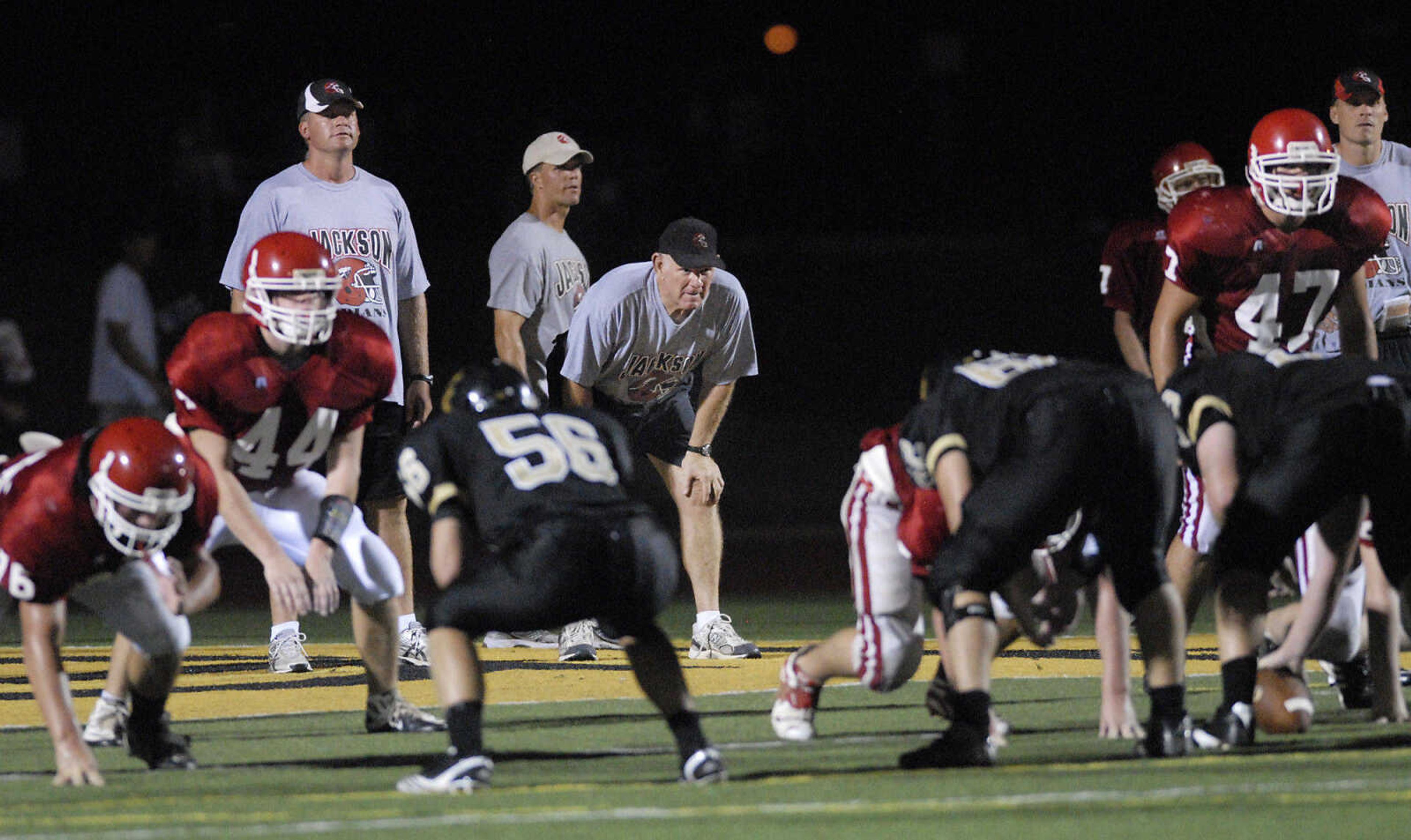 KRISTIN EBERTS ~ keberts@semissourian.com

Jackson coaches watch during a jamboree game against Farmington on Friday, August 20, 2010, at Farmington High School.