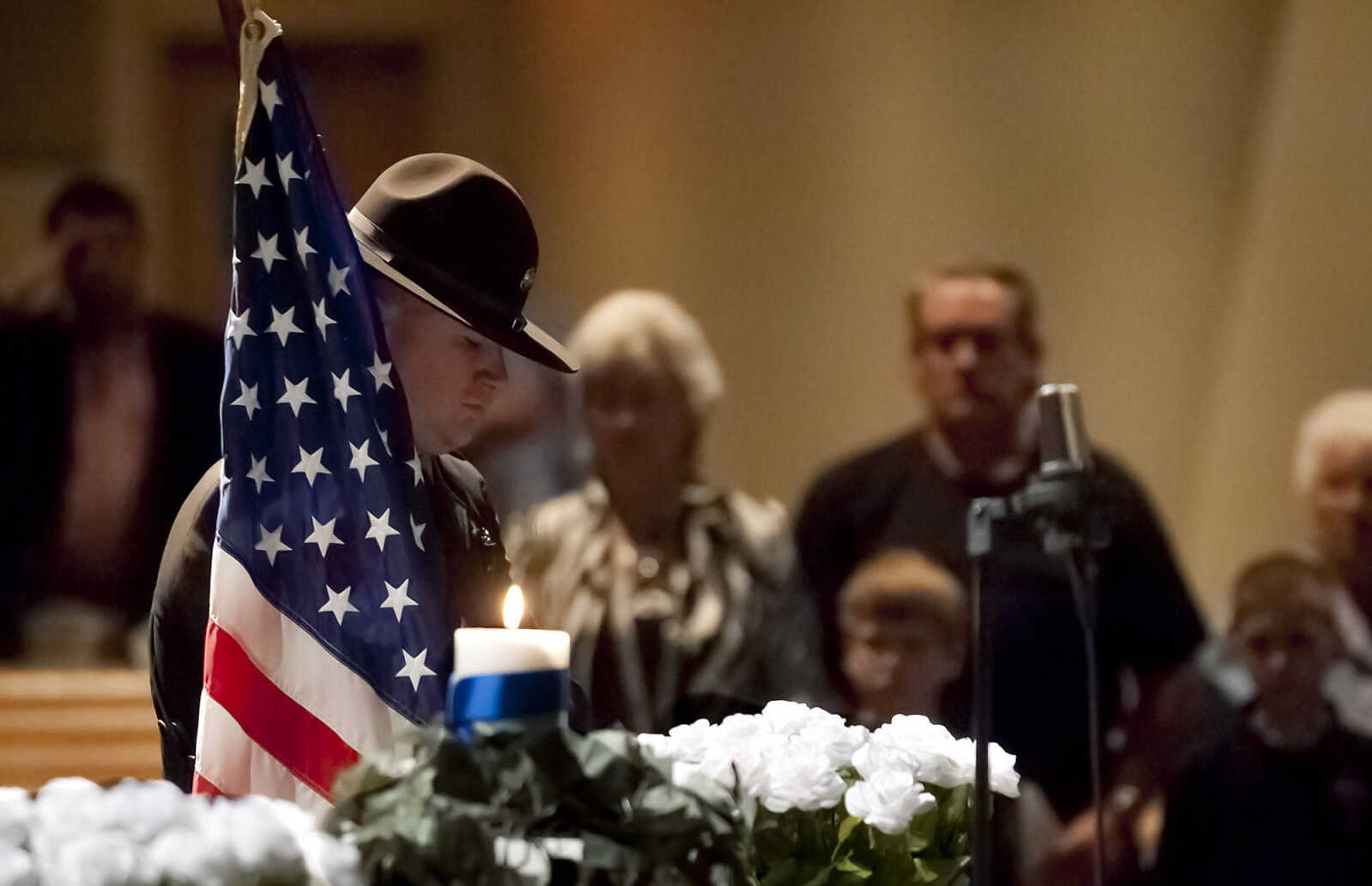 A member of the Cape Girardeau County Sheriff's Office Color Guard posts the colors during the Senior and Lawmen Together Law Enforcement Memorial Friday, May 9, at the Cape Bible Chapel. The annual memorial honored the 48 Southeast Missouri law enforcement officers that have died in the line of duty since 1875.