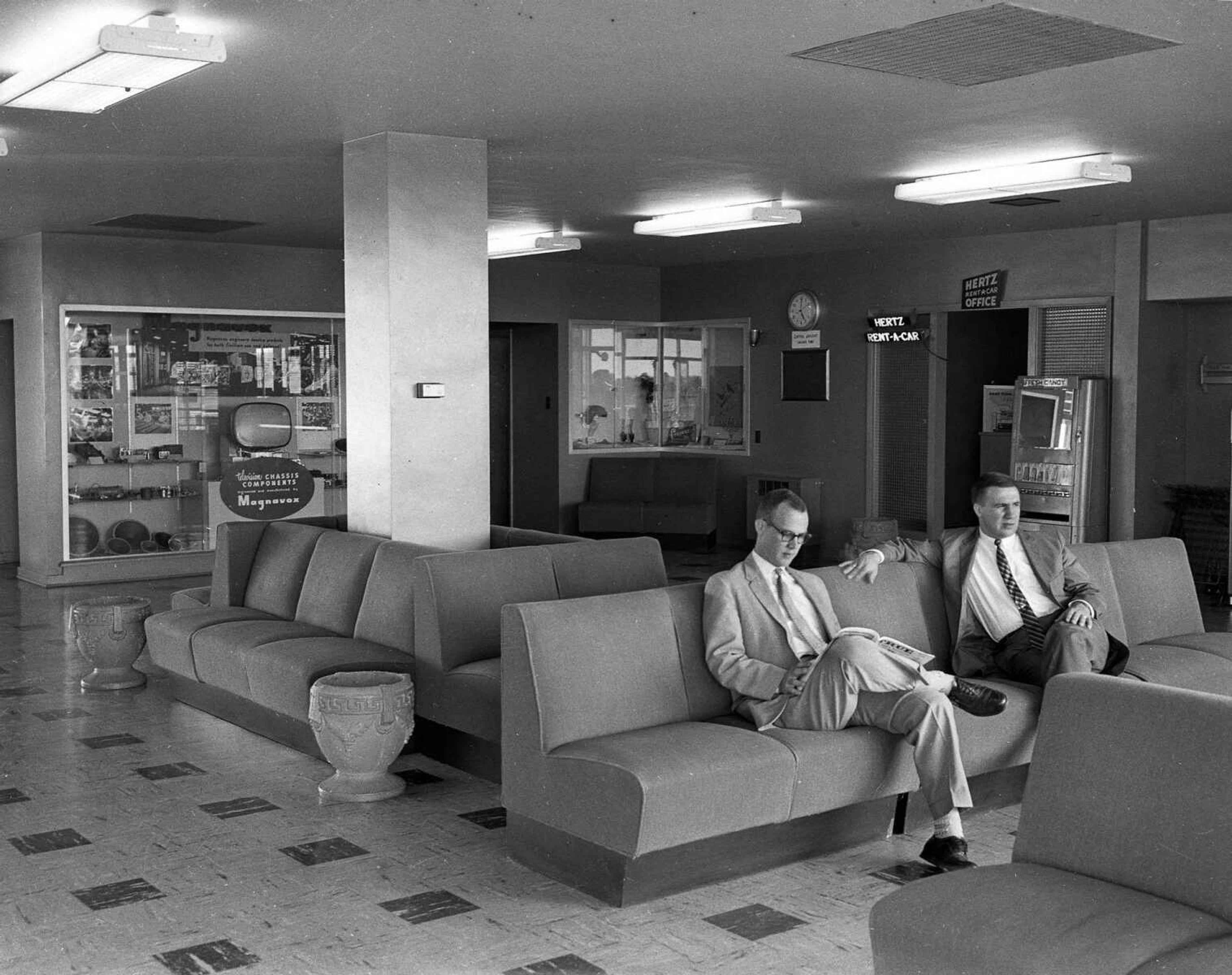 G.D. Fronabarger likely took this picture to illustrate a story, or ad, about the comfortable waiting area at the Cape Girardeau Municipal Airport.