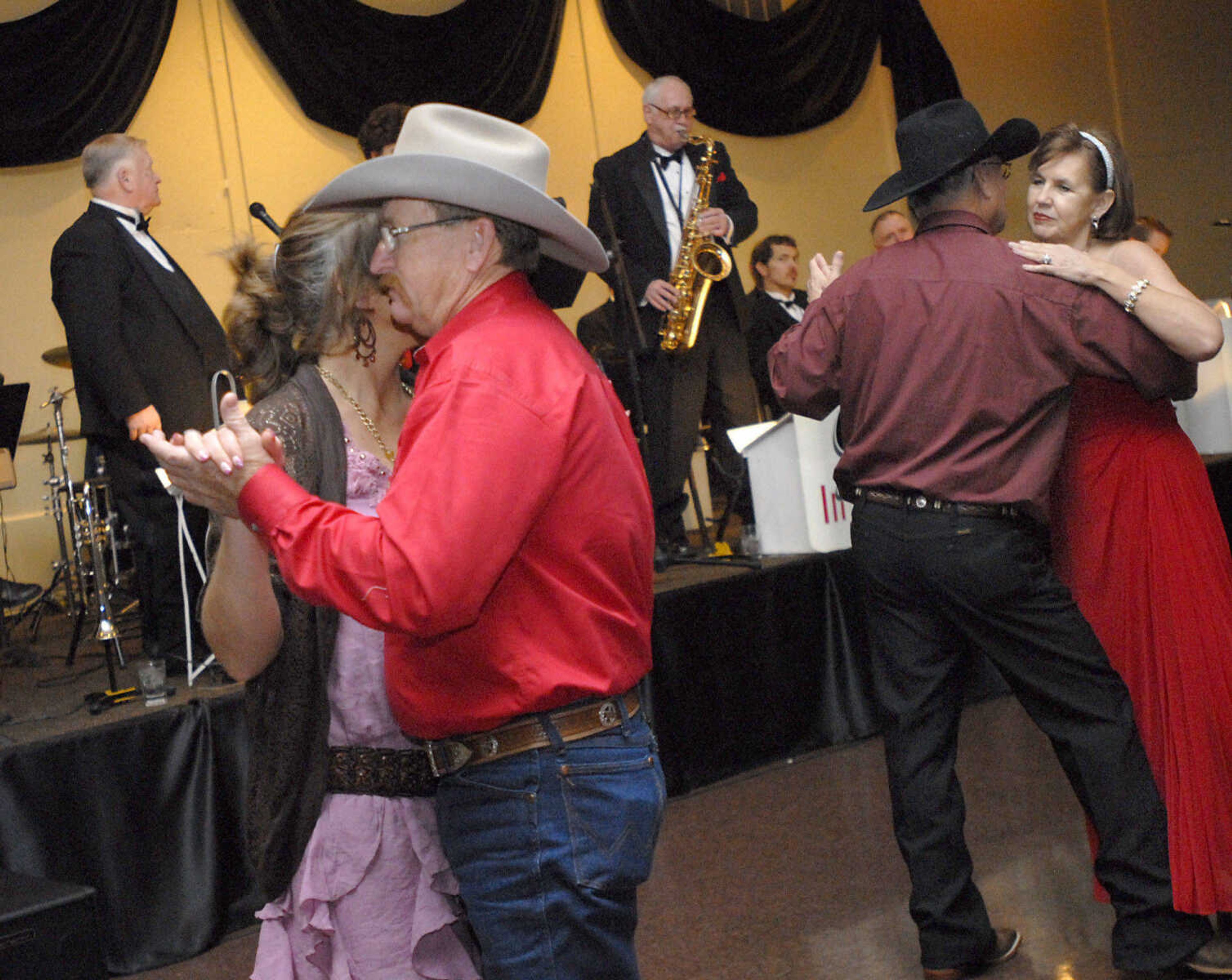 KRISTIN EBERTS ~ keberts@semissourian.com

Couples dance to the music of the Jerry Ford Orchestra during the Valentine's Dinner and Dance at Ray's Plaza Conference Center in Cape Girardeau on Saturday, Feb. 11, 2012.