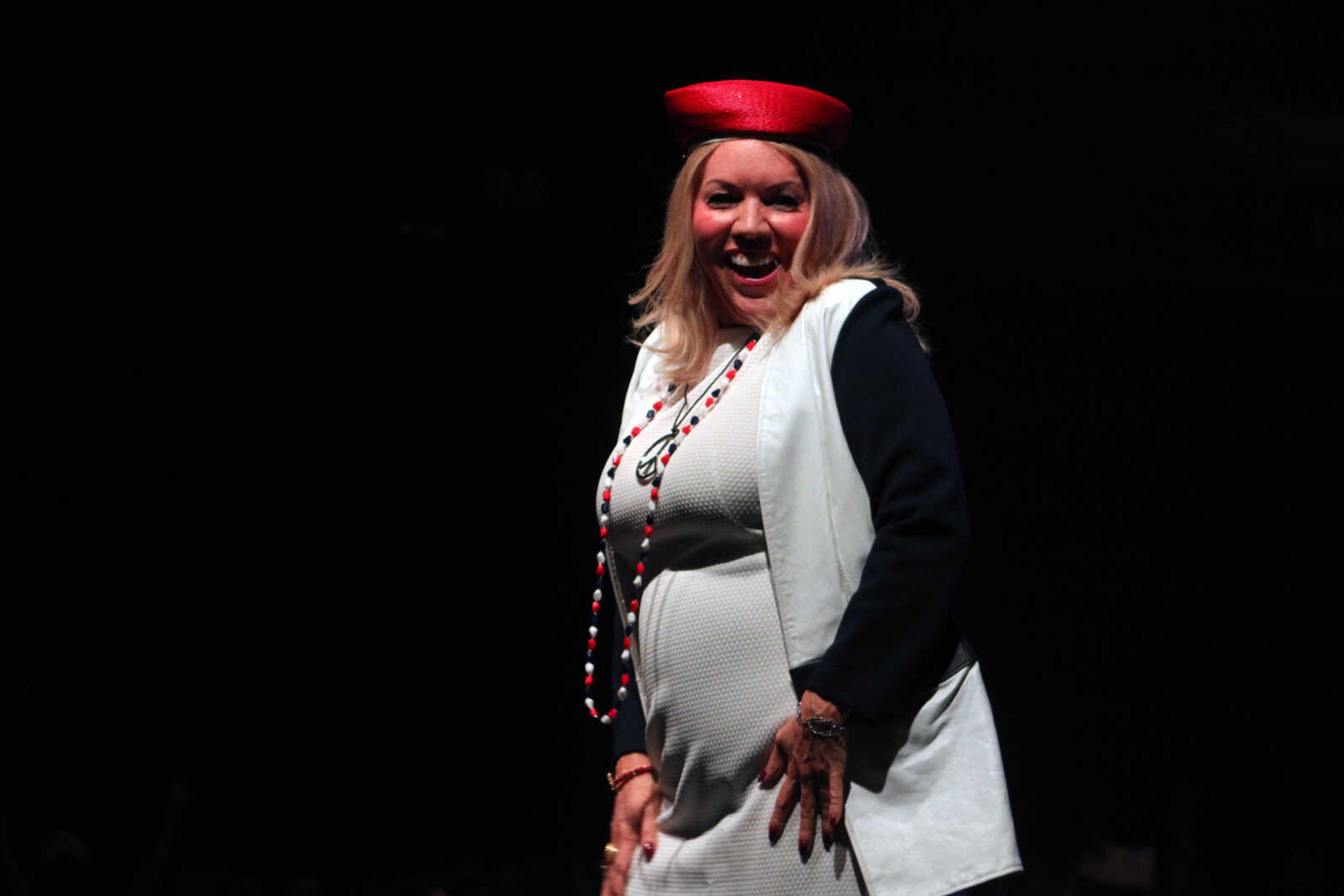 Community women perform as models and dancers in the 11th VintageNOW fashion show Saturday, Oct. 9, 2021, at the Show Me Center in Cape Girardeau.