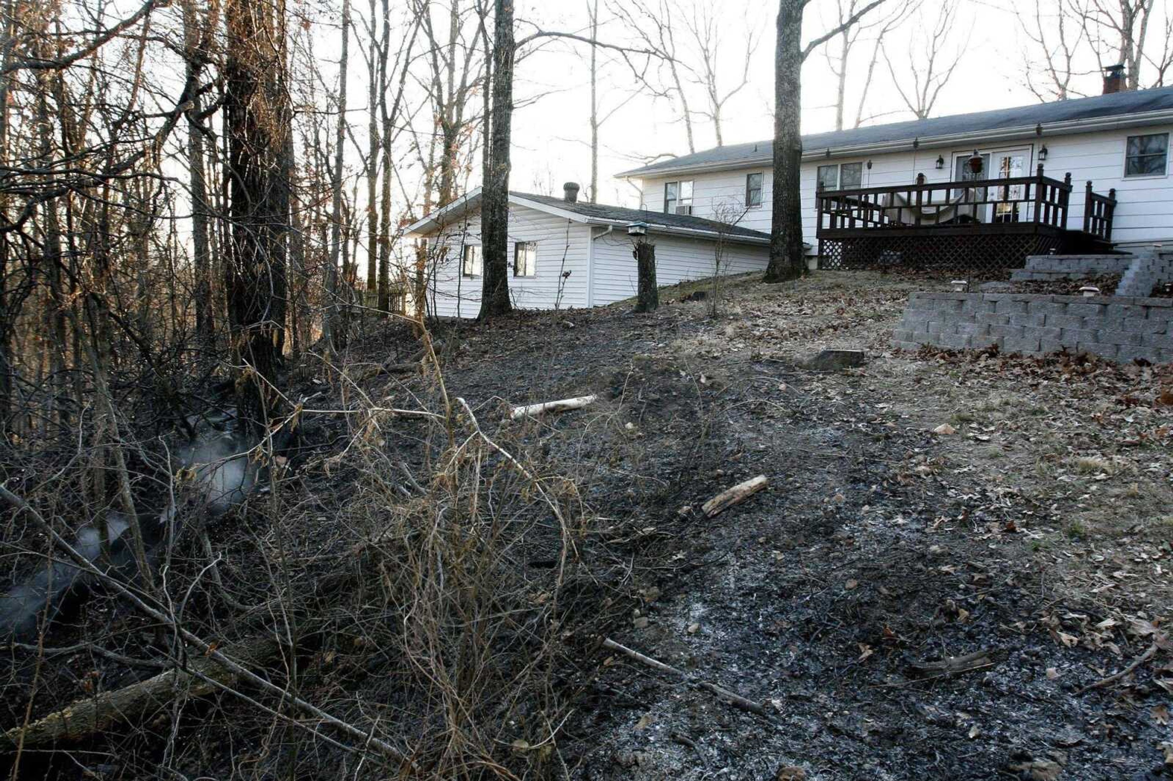 ELIZABETH DODD ~ edodd@semissourian.com<br>A fire burned two acres of property on County Road 553 Thursday in Fruitland. According to assistant chief Andy Renner, the fire is suspected have started from a resident throwing out ashes from a wood stove the night before. "It's definitely getting dry out there," Renner said. The Fruitland Area Fire Department was able to stop the fire five feet from the home.