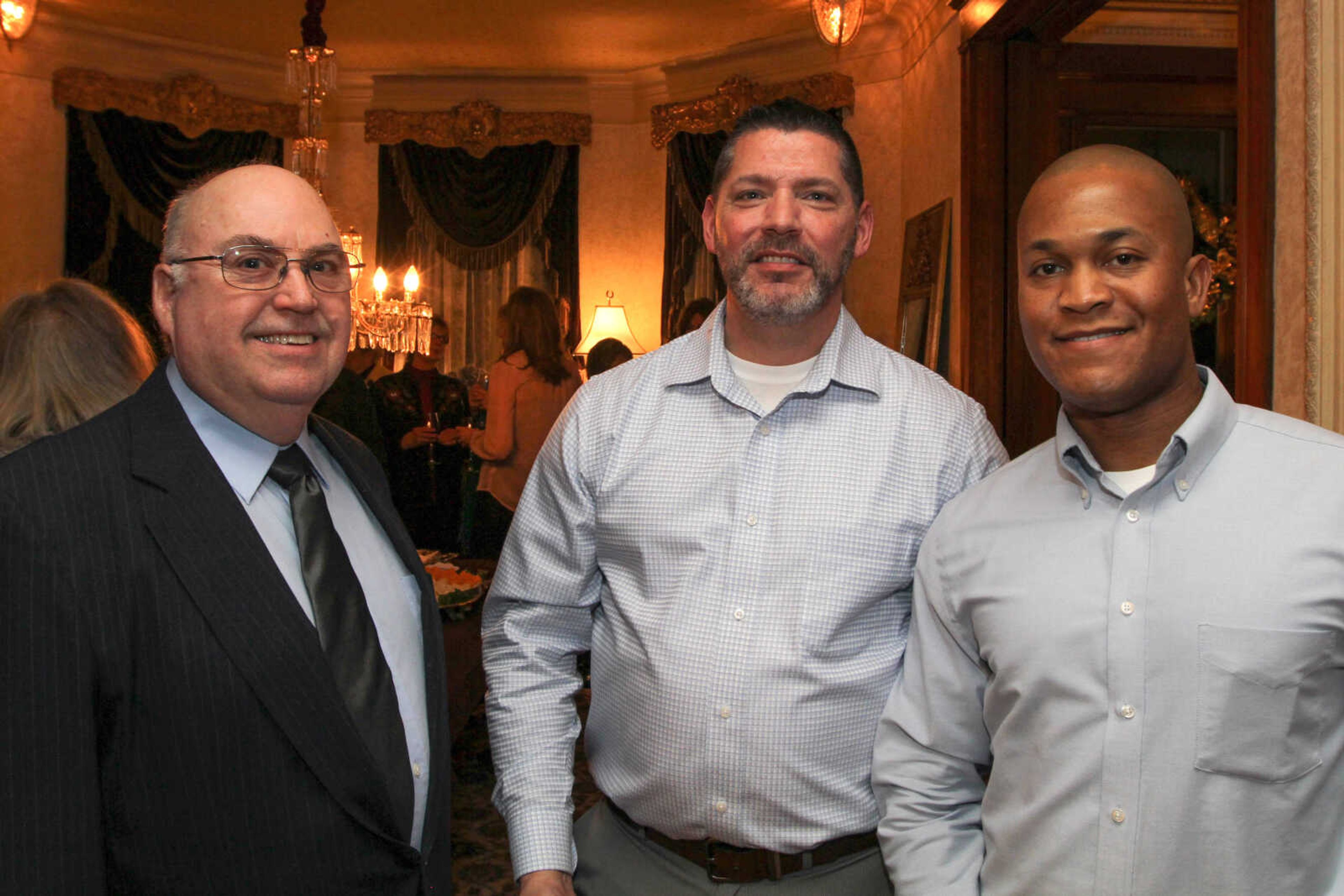 GLENN LANDBERG ~ glandberg@semissourian.com

Mike Seyer, left, James Seyer and Larry Rhodes pose for a photo during the second annual Dingeldein Gala at the Oliver-Leming House Friday, Jan. 16, 2014.