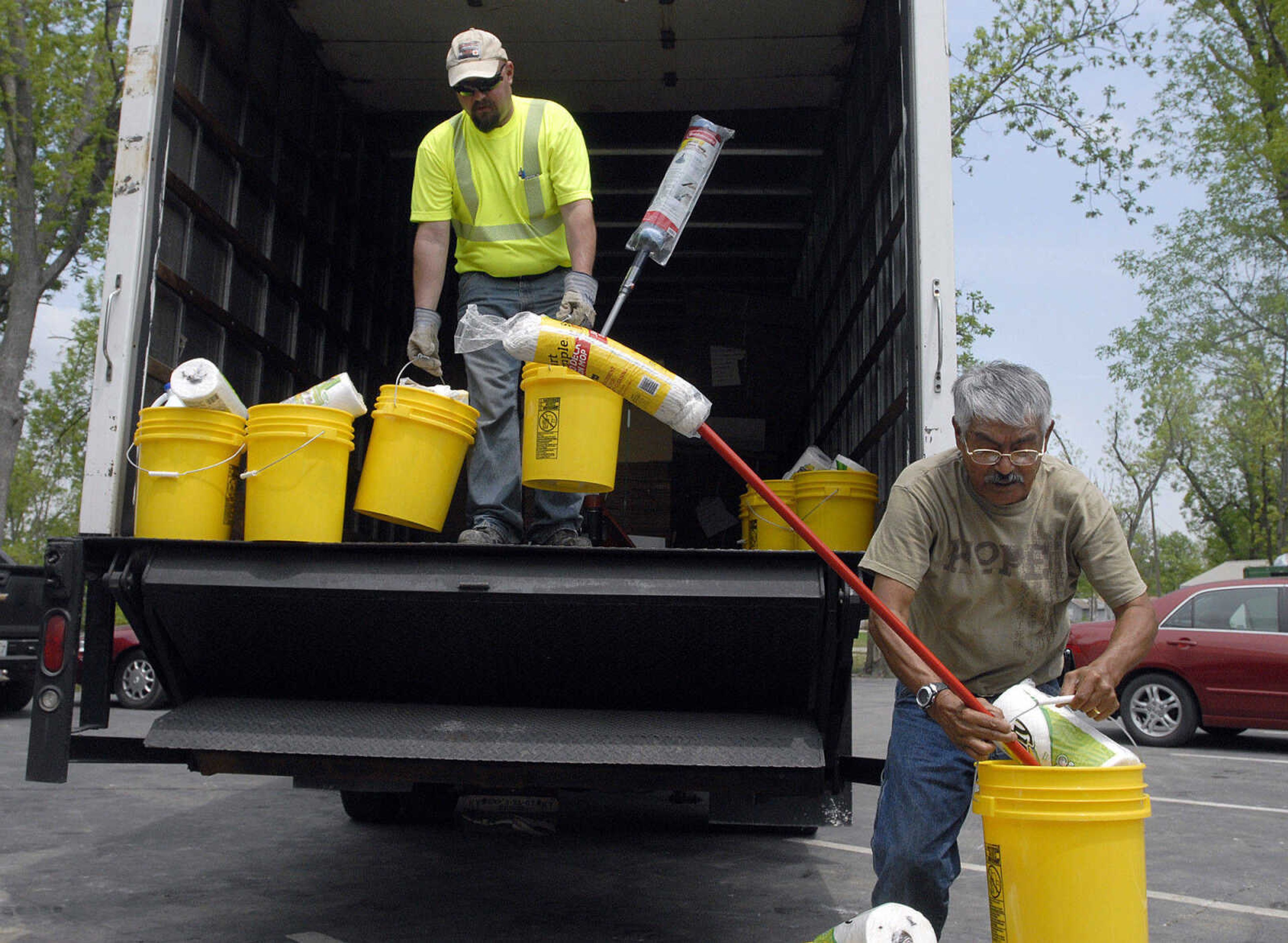 LAURA SIMON~lsimon@semissourian.com
Morehouse Mayor Pete Leija unloads cleaning supplies outside First General Baptist Church Wednesday, May 11, 2011 in Morehouse.