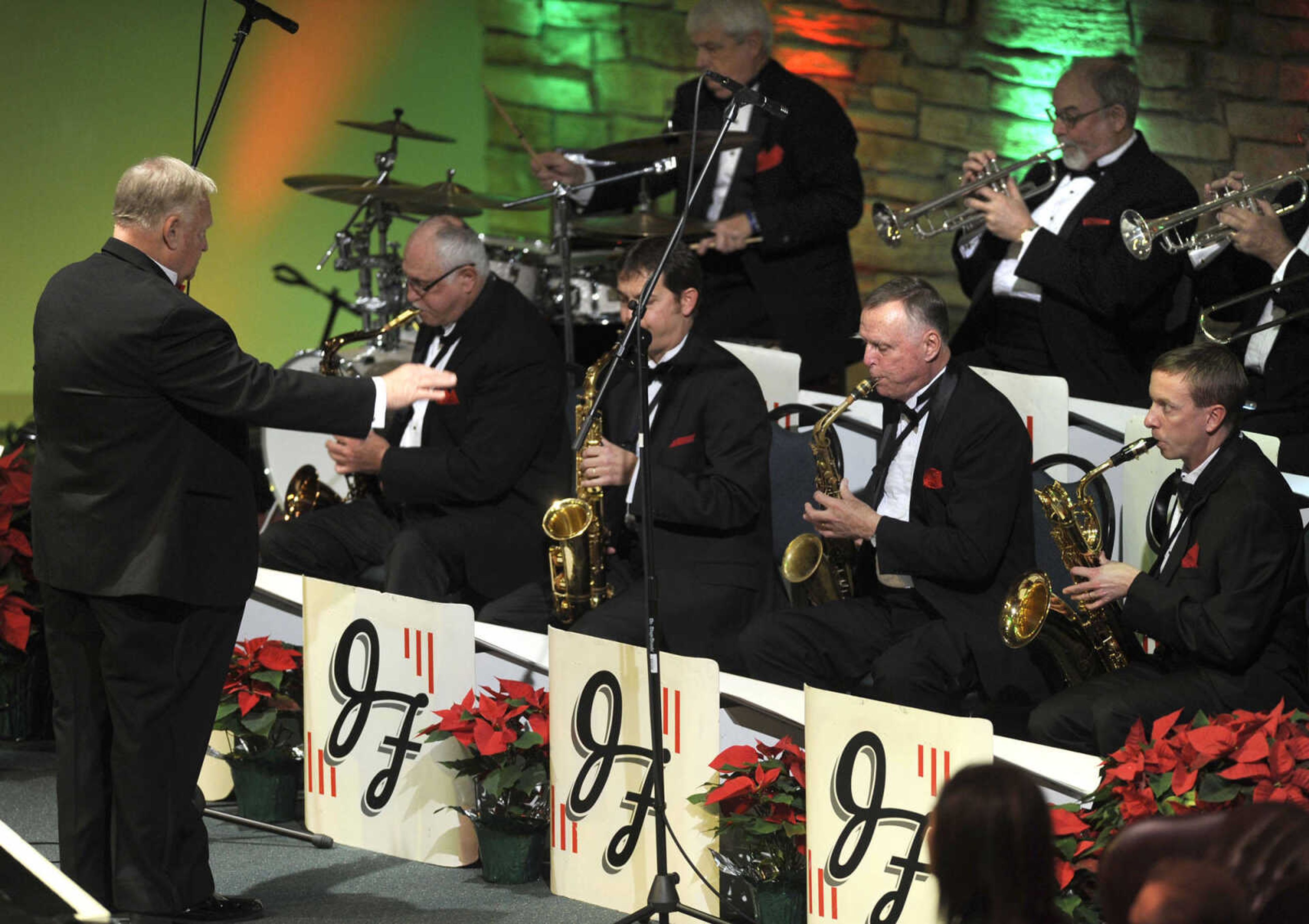 Jerry Ford directs his orchestra at the Sounds of the Season Christmas concert Sunday, Dec. 7, 2014 at Cape Bible Chapel.