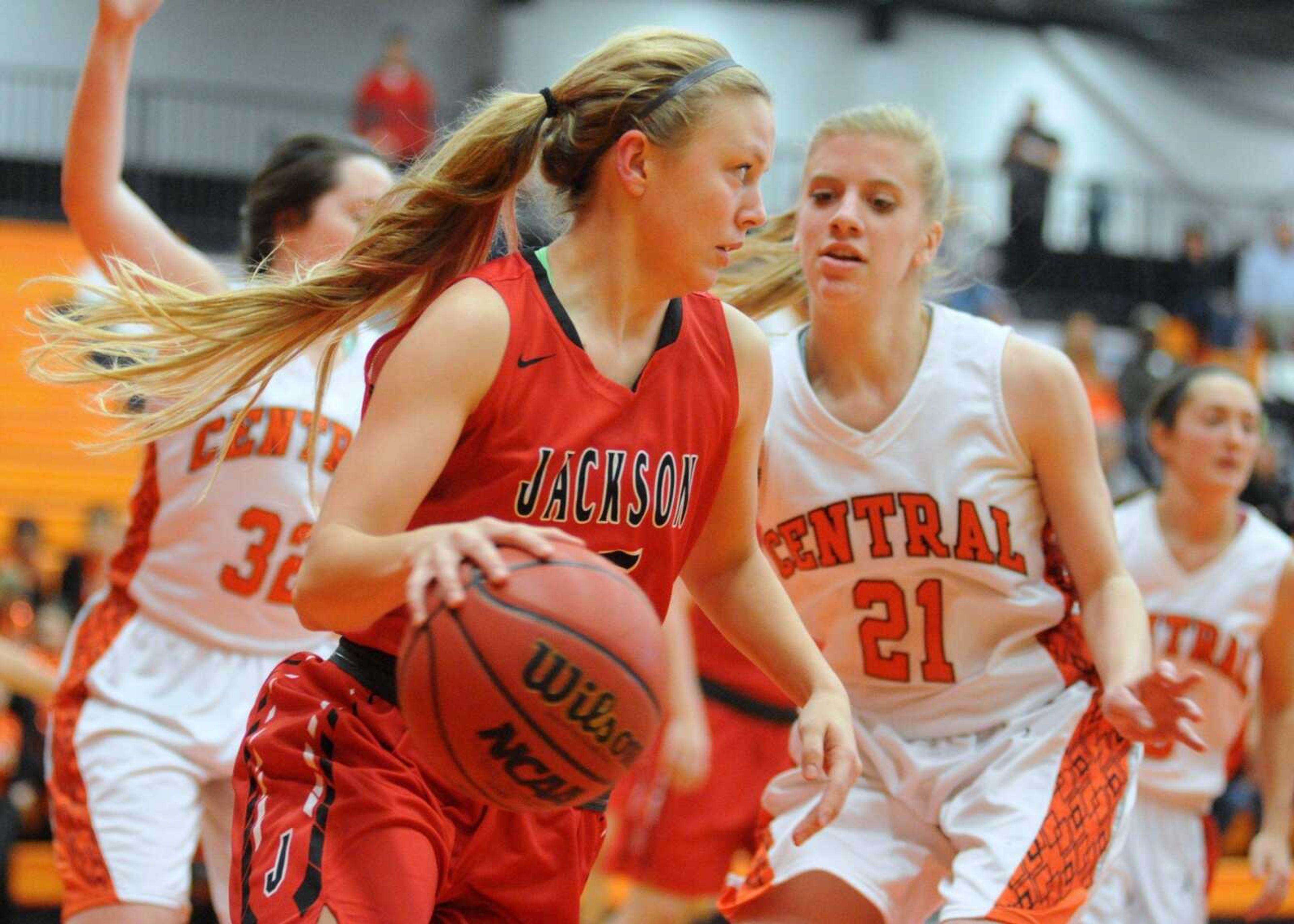 Jackson's Rylee Stafford dribbles while being defended by Cape Central's Kassidy Pannier during the first quarter Tuesday, Jan. 14, 2016 at Cape Central High School. (TRENT SINGER)