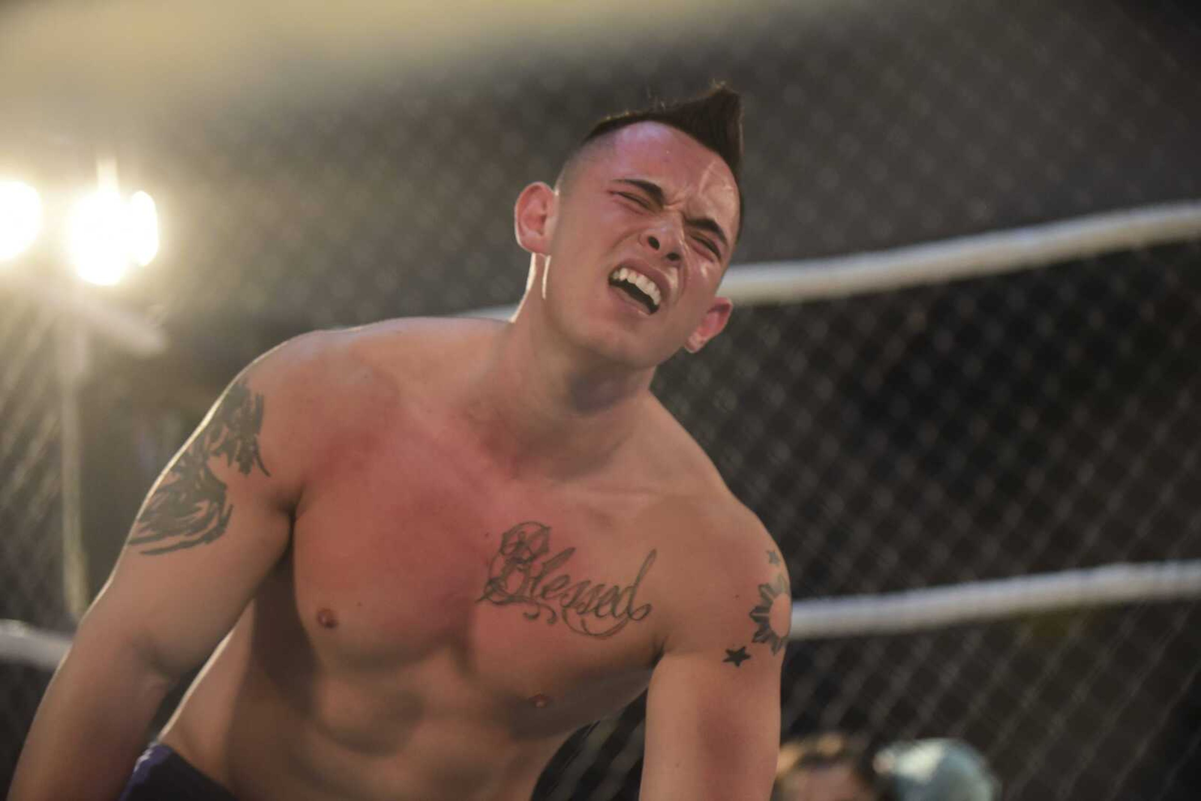 JD Wilk reacts after getting hit during the Cape Championship Wrestling match Saturday at the Arena Building in Cape Girardeau.