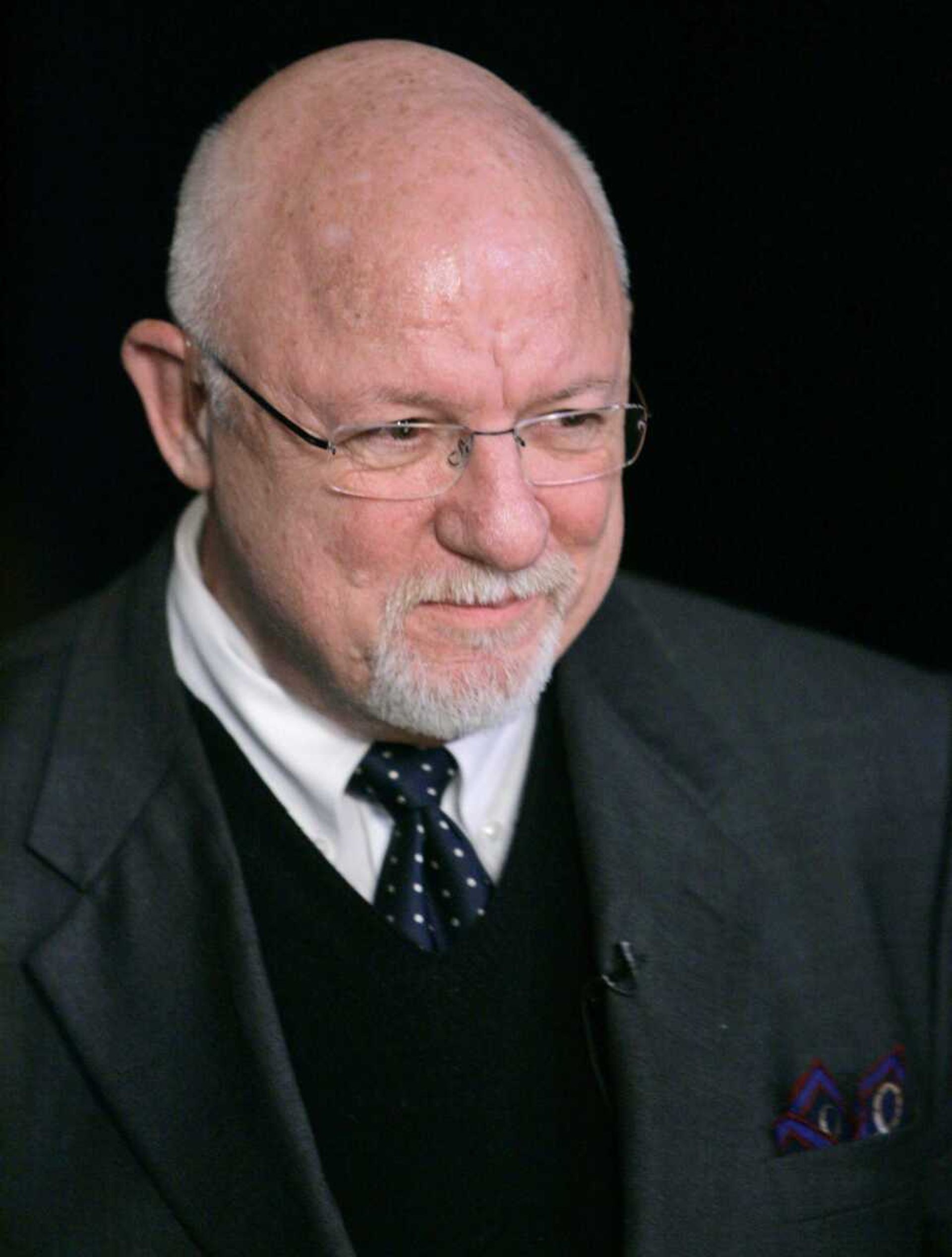 Republican presidential hopeful former Arkansas Gov. Mike Huckabee's national campaign manager Ed Rollins is seen during a television interview at a victory party in Des Moines, Iowa, Thursday, Jan. 3, 2008, after Huckabee was called the winner of the Iowa Republican caucus. (AP Photo/Paul Sancya)