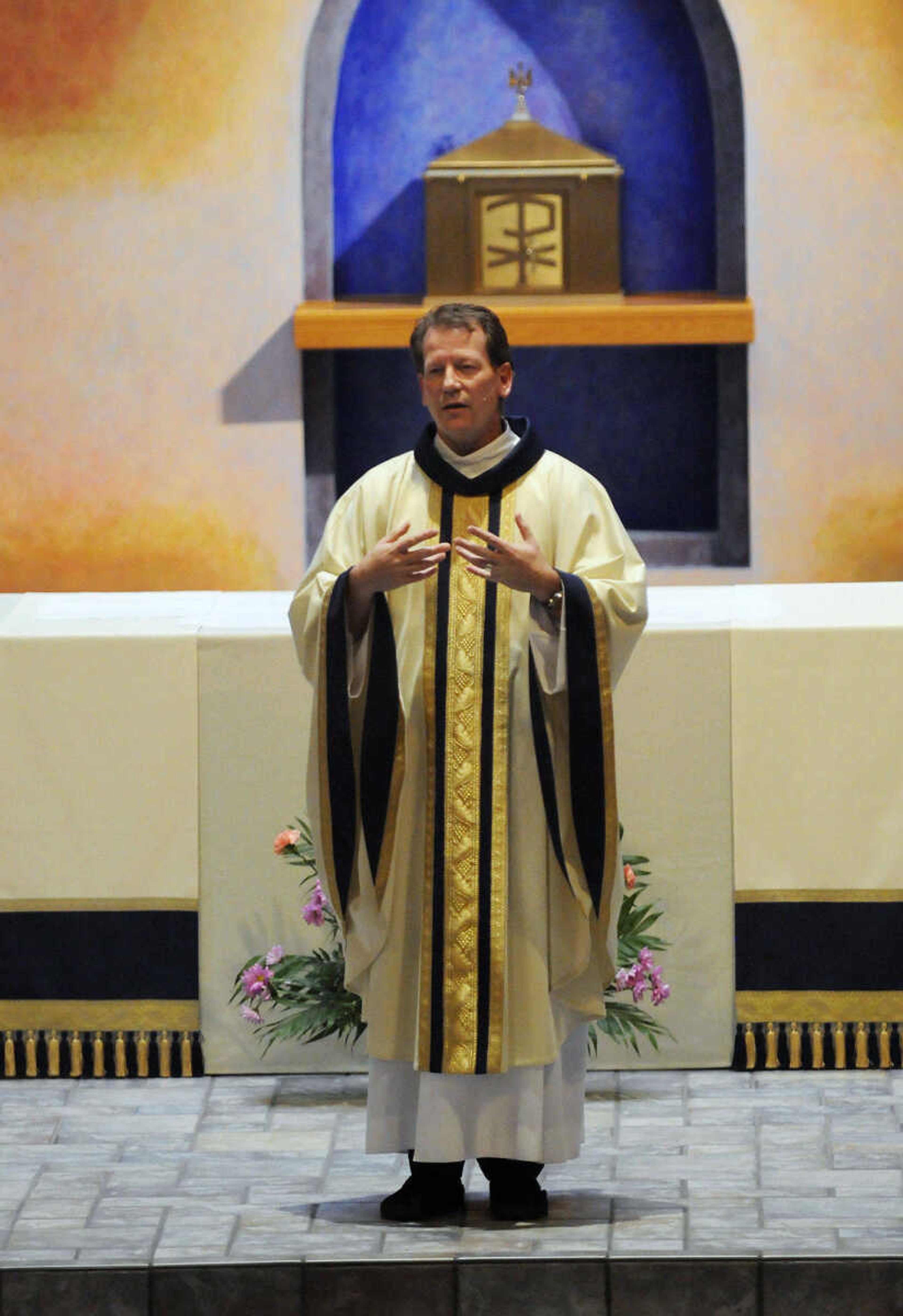 KRISTIN EBERTS ~ keberts@semissourian.com

Father Joseph Williams leads Mass at St. Vincent De Paul parish in Perryville, Mo., on Friday, Oct. 15, 2010. The Mass was followed by an assembly to celebrate the school's recognition on the list of the best 50 Catholic secondary schools in America, presented by the Catholic High School Honor Roll. This is the first time St. Vincent has received this distinction.