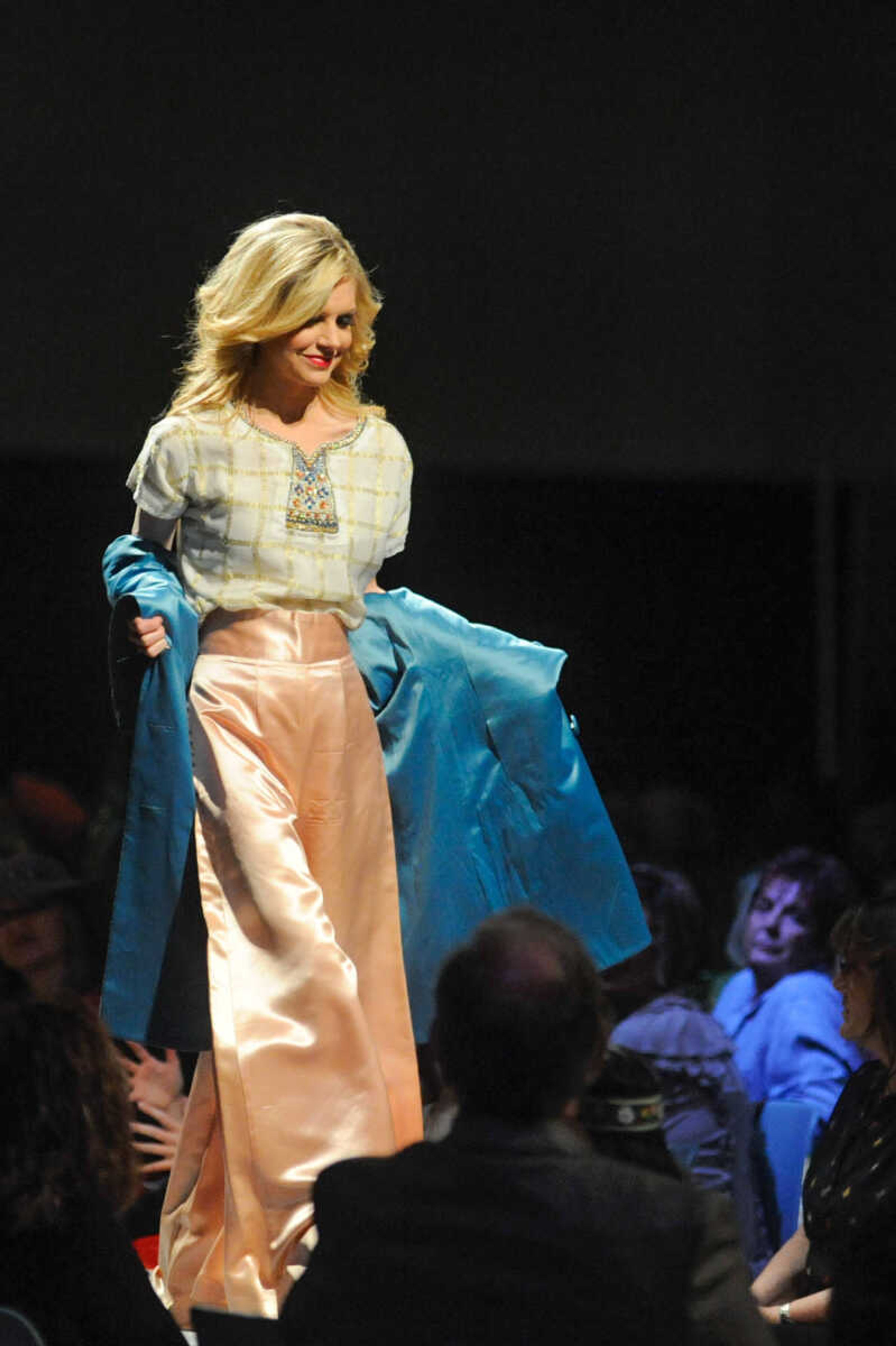 GLENN LANDBERG ~ glandberg@semissourian.com


Models make their way down the runway during the VintageNOW fashion show at the Osage Centre on Saturday, October 24, 2015. Proceeds benefited the Safe House for Women.