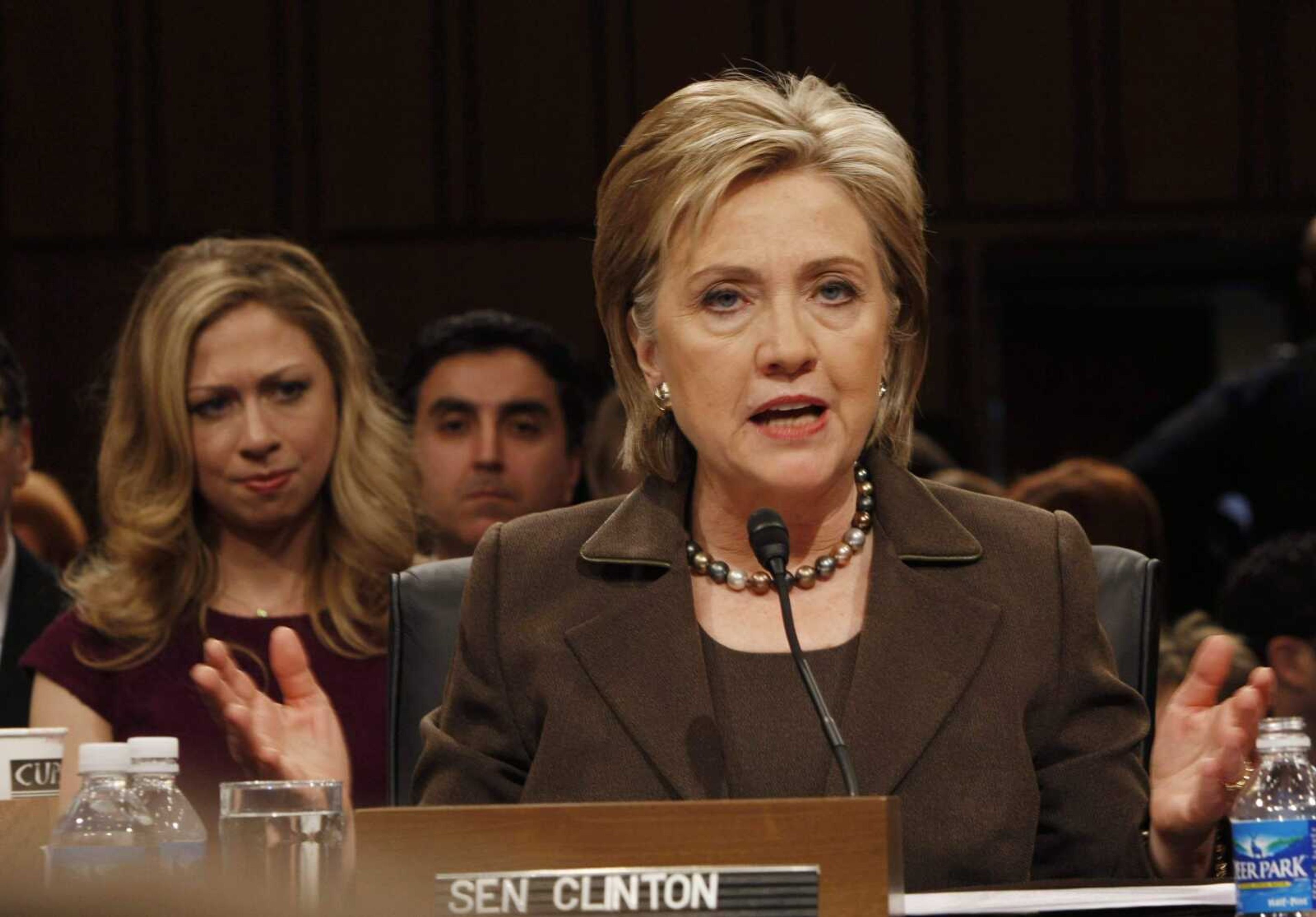 Gerald Herbert ~ Associated Press<br>Sen. Hillary Rodham Clinton, D-N.Y., speaks during a confirmation hearing for her nomination as secretary of state as her daughter, Chelsea Clinton, watches Jan. 13 before the Senate Foreign Relations Committee on Capitol Hill in Washington, D.C. The Senate has confirmed Hillary Clinton to become secretary of state.