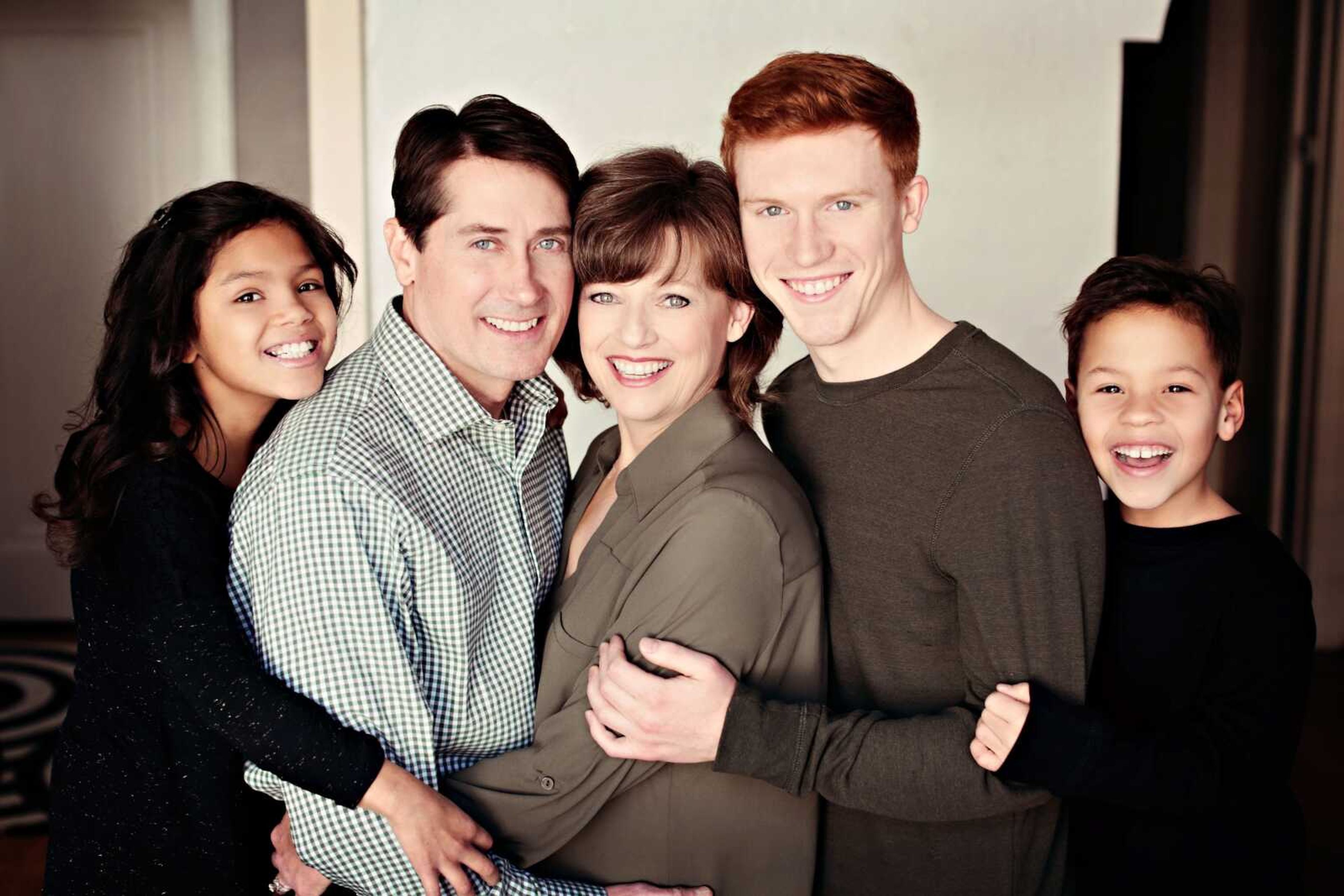 Sandi Essner, center, in an undated family photo prior to her diagnosis.