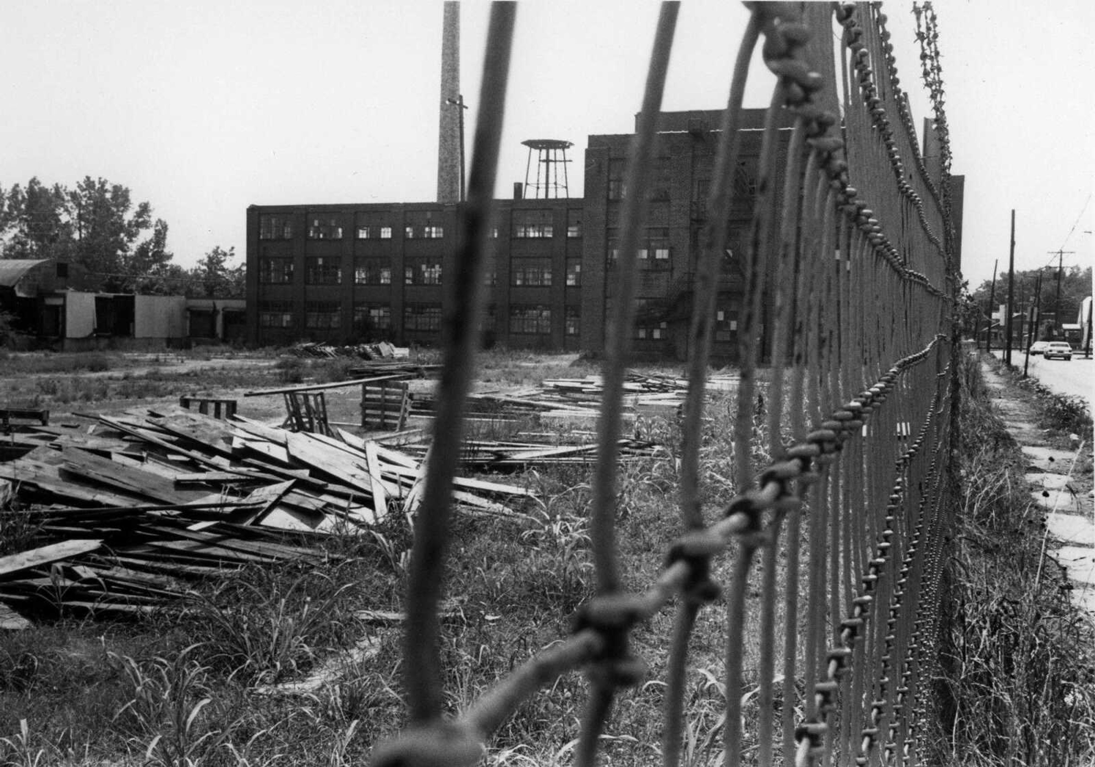 Florsheim Shoe Co. on North Main Street, 1988. The structure was donated to the Cape Girardeau Chamber of Commerce in 1984. Demolition of the building was completed in 1990. View is from the north.