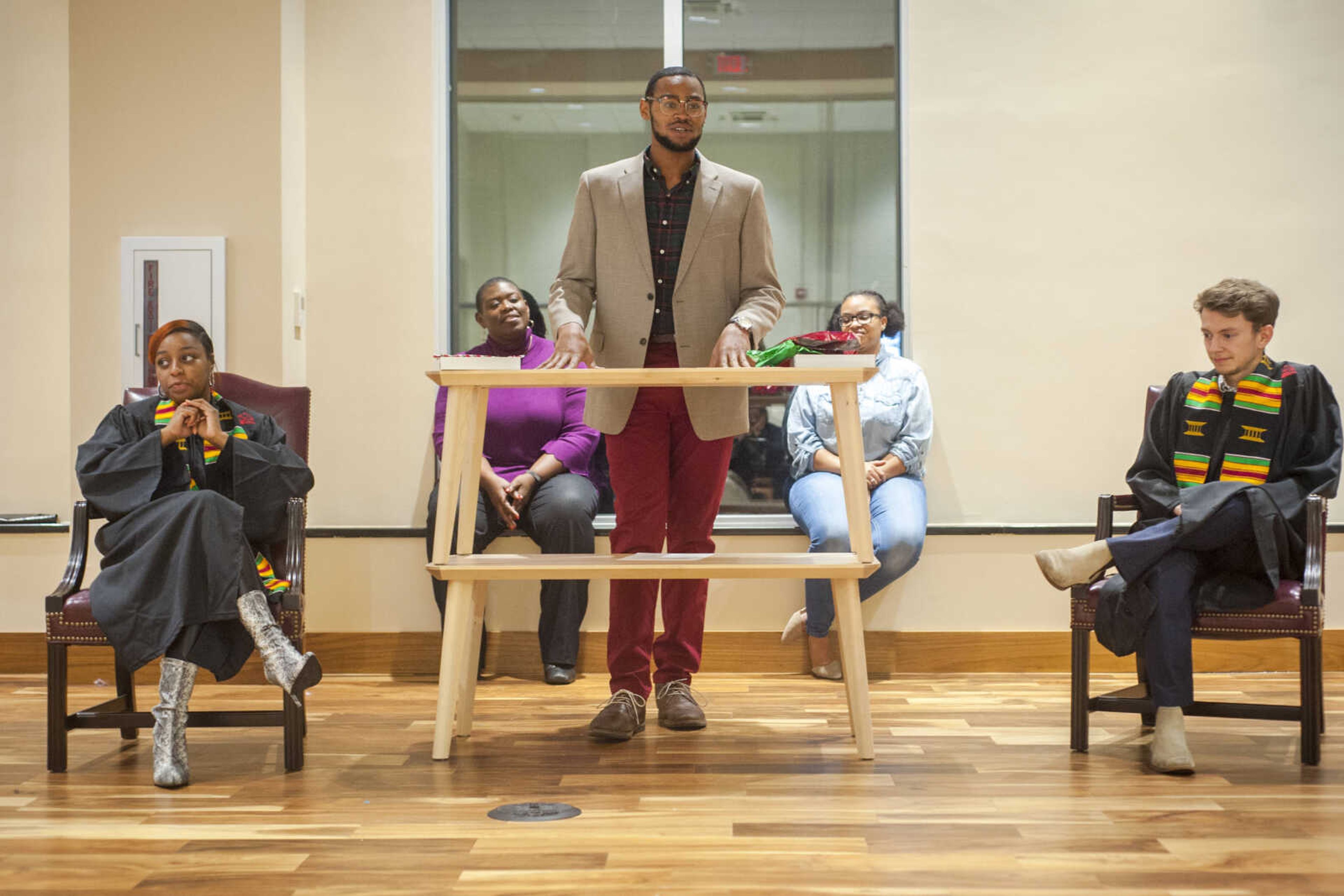 Patrick Buck, president of the National Association of Black Journalists at Southeast Missouri State University, welcomes guests to the inaugural "Donning of the Kente" ceremony Monday, Dec. 9, 2019, at Rust Center for Media, which recognized graduating NABJ members.