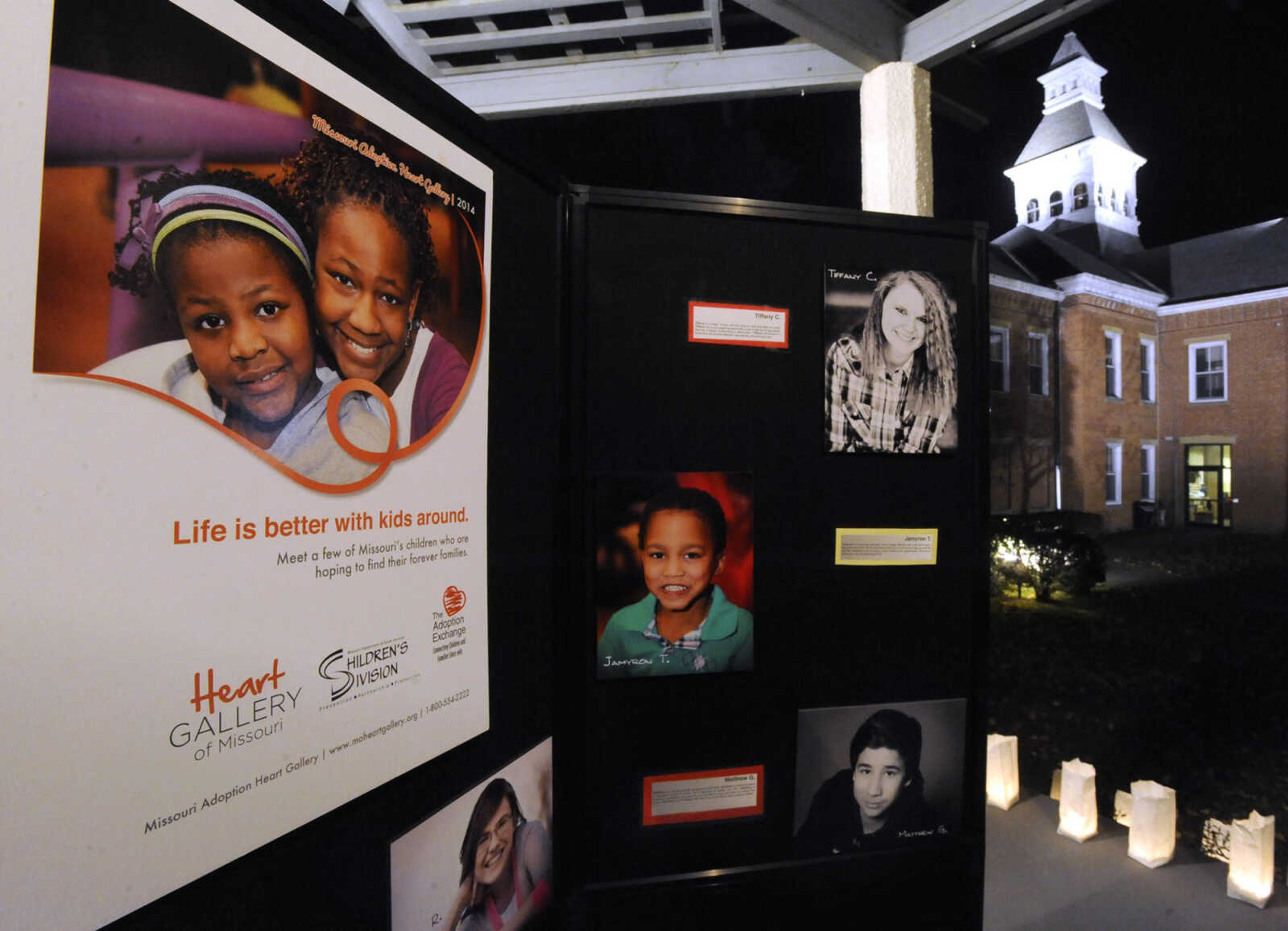 The Missouri Heart Gallery was on display for the Orphan Sunday Candlelight Vigil at Common Pleas Courthouse gazebo Sunday, Nov. 2, 2014 in Cape Girardeau. The gallery may be viewed online at moheartgallery.org.