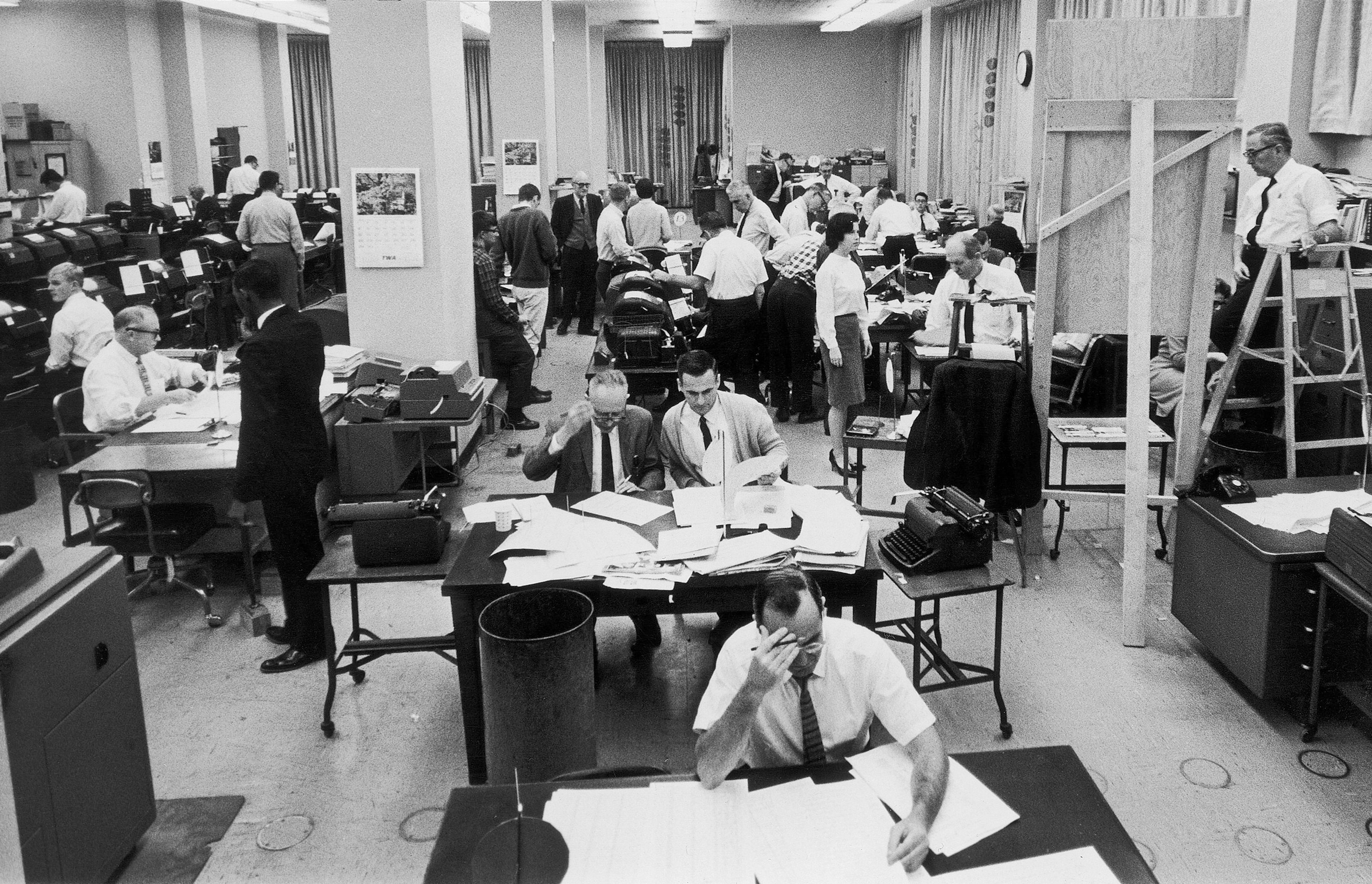 FILE - Staffers work on election night at the Washington bureau of The Associated Press on Nov. 3, 1964. (AP Photo, File)