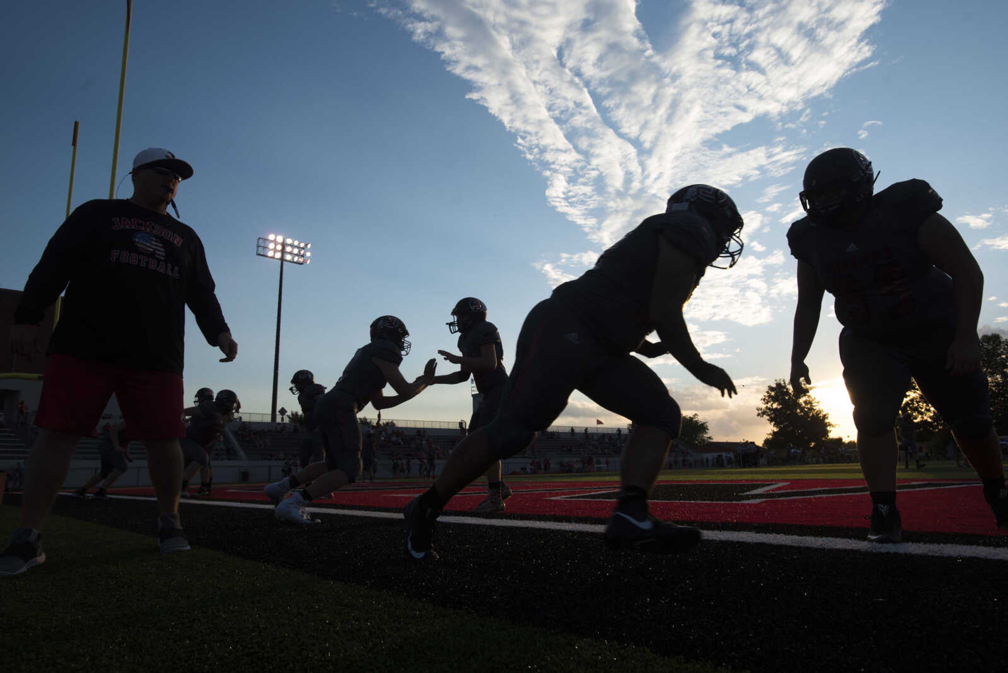 Jackson players warm up for a game against Poplar Bluff on Friday, Oct. 5, 2018, at Jackson High School.