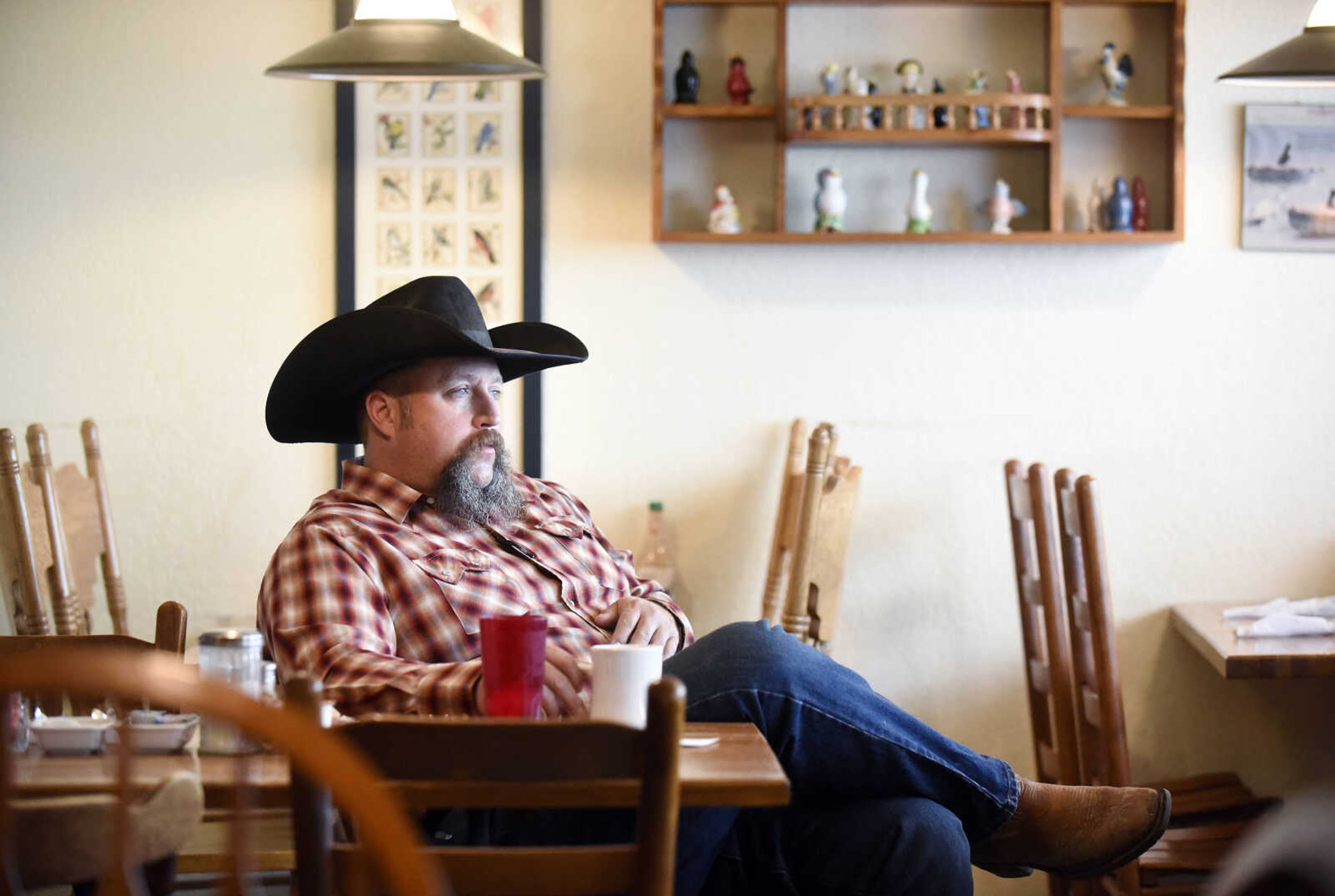 Lonnie Peterson relaxes with his cup of coffee after eating breakfast at the Pie Bird Cafe in Jackson on Tuesday, March 28, 2017.