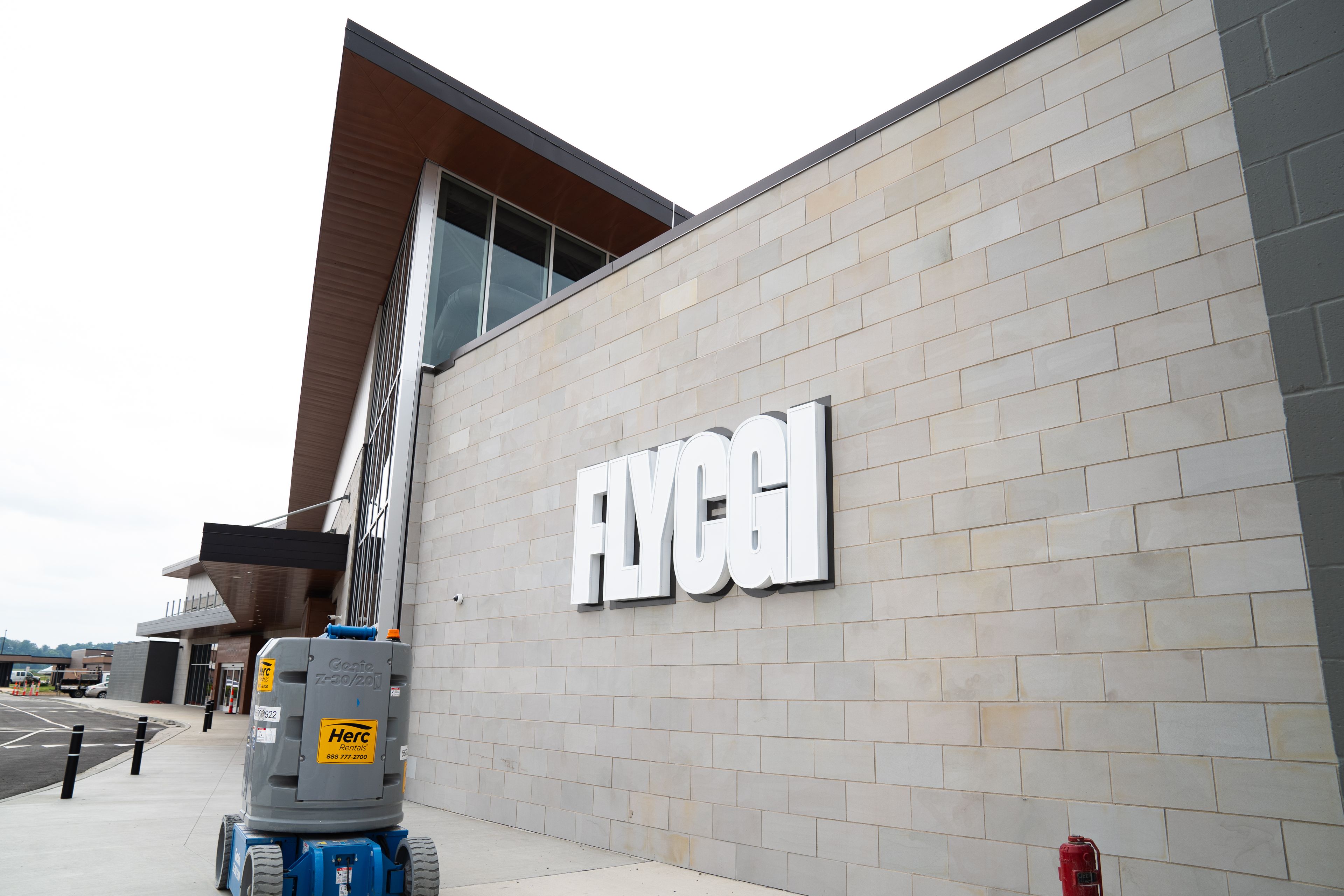 The Fly CGI sign hangs on the new Cape Girardeau Regional Airport where renovations are being finished ahead of the terminals' expected Aug. 22 opening.