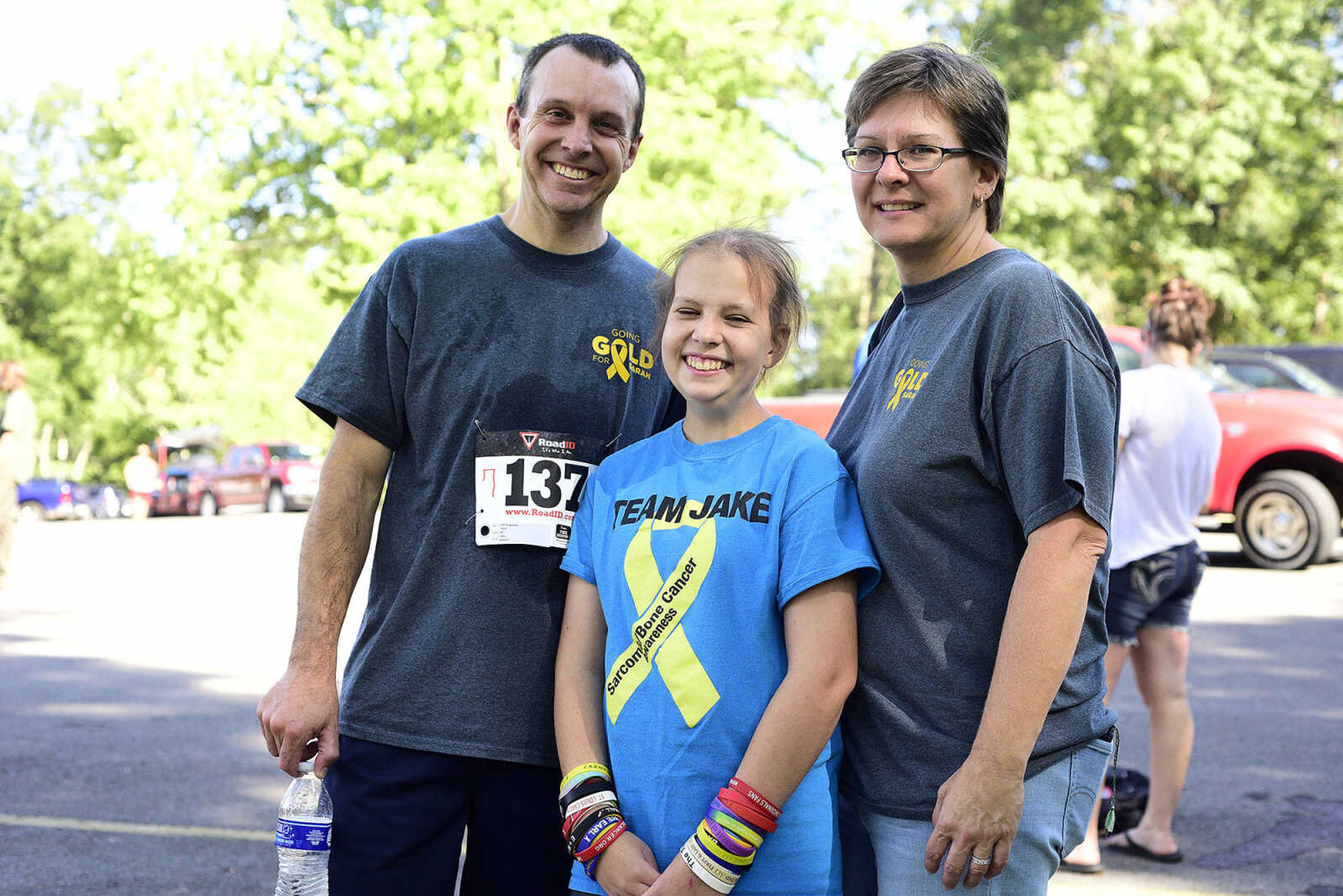 Phil, left, Sarah, center, and Jennifer Singleton pose for a photo during the first ever St. Jude Heroes Yak 'n Run on Saturday, Aug. 26, 2017, at Trail of Tears State Park. All proceeds from the event support St. Jude Children's Research Hospital