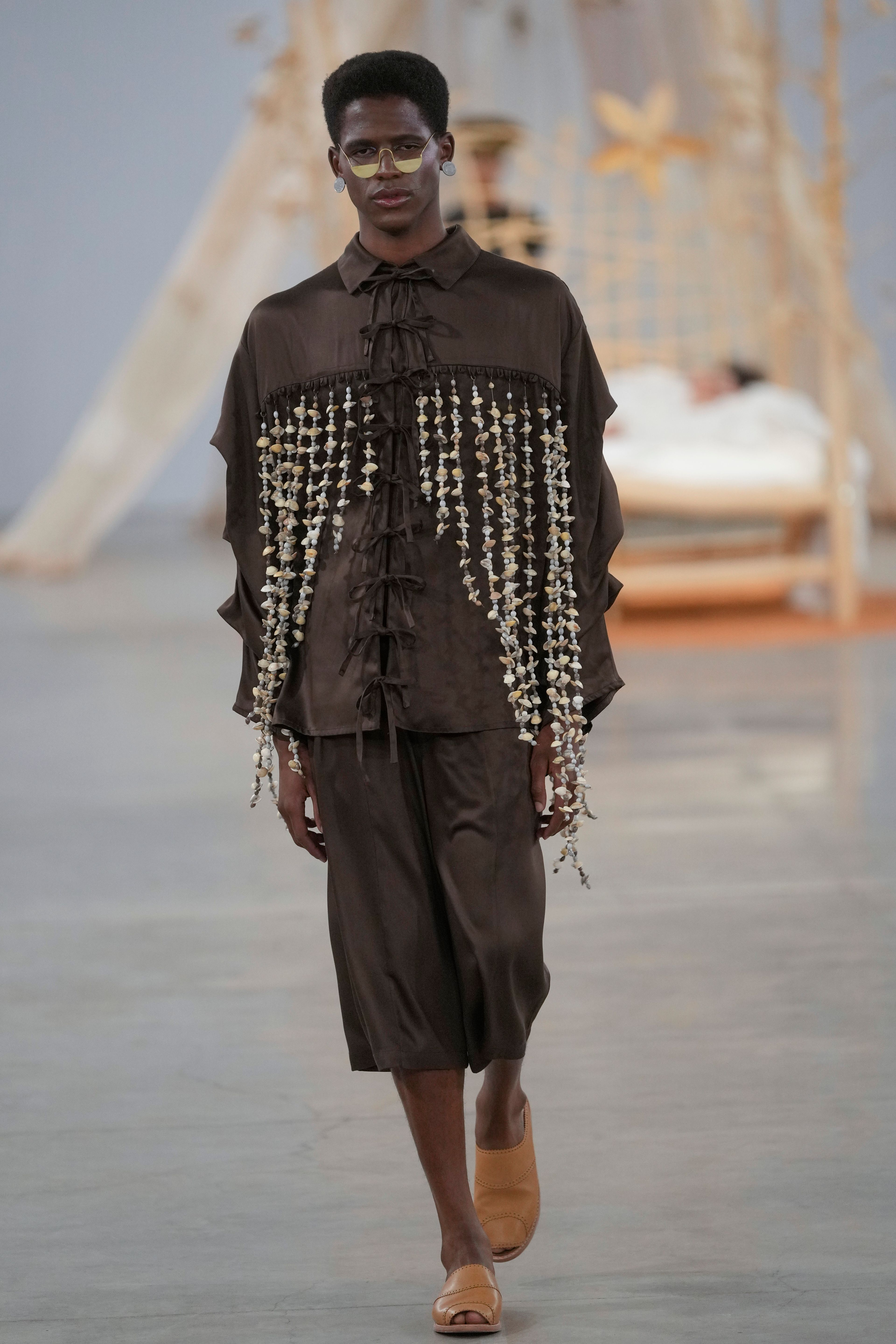 A model wears a creation from the Foz collection during Sao Paulo Fashion Week in Sao Paulo, Wednesday, Oct. 16, 2024. (AP Photo/Andre Penner)