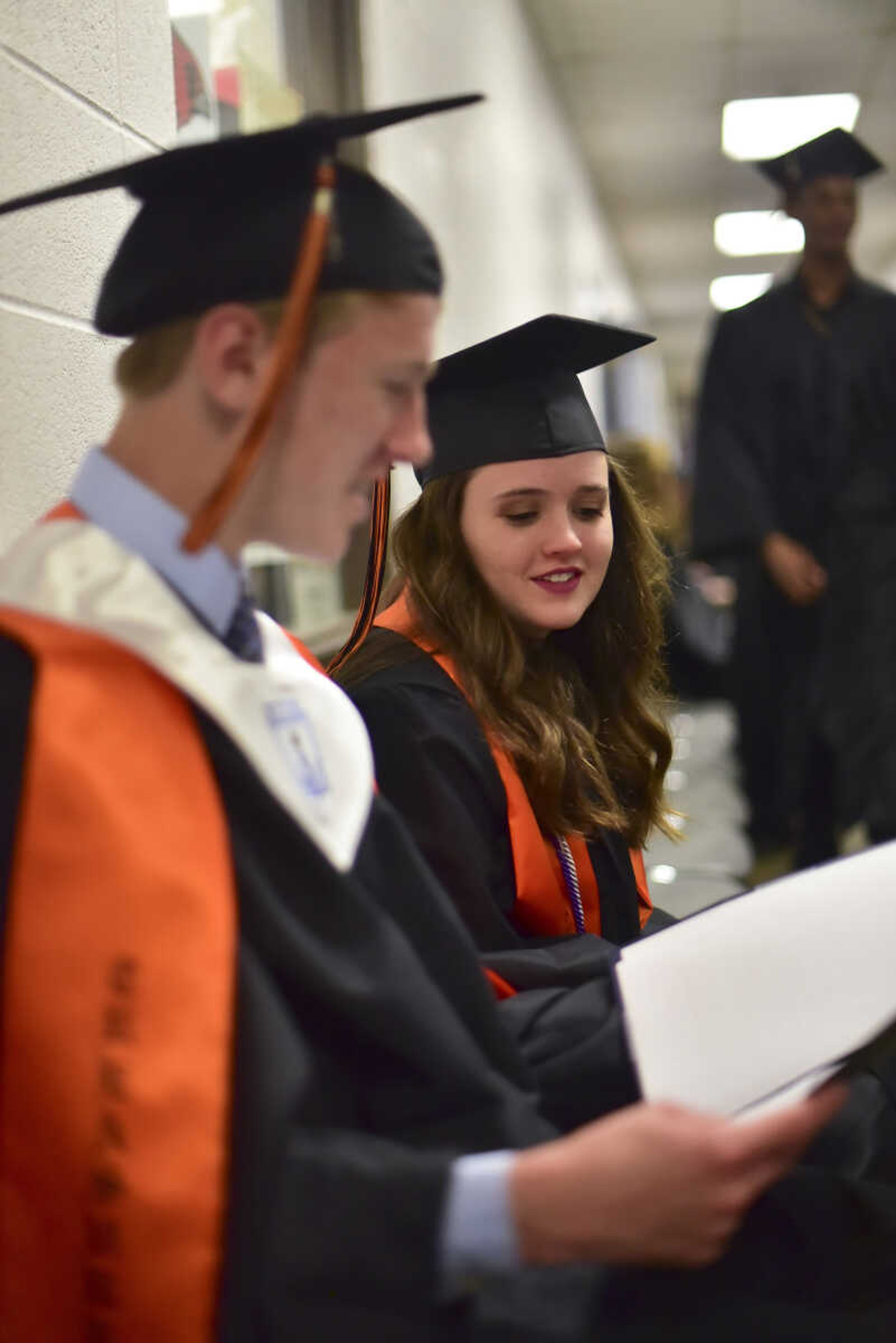 Bennett Kidd and Olivia Priest go over speeches during Cape Girardeau Central High School graduation Sunday, May 14, 2017at the Show Me Center in Cape Girardeau.