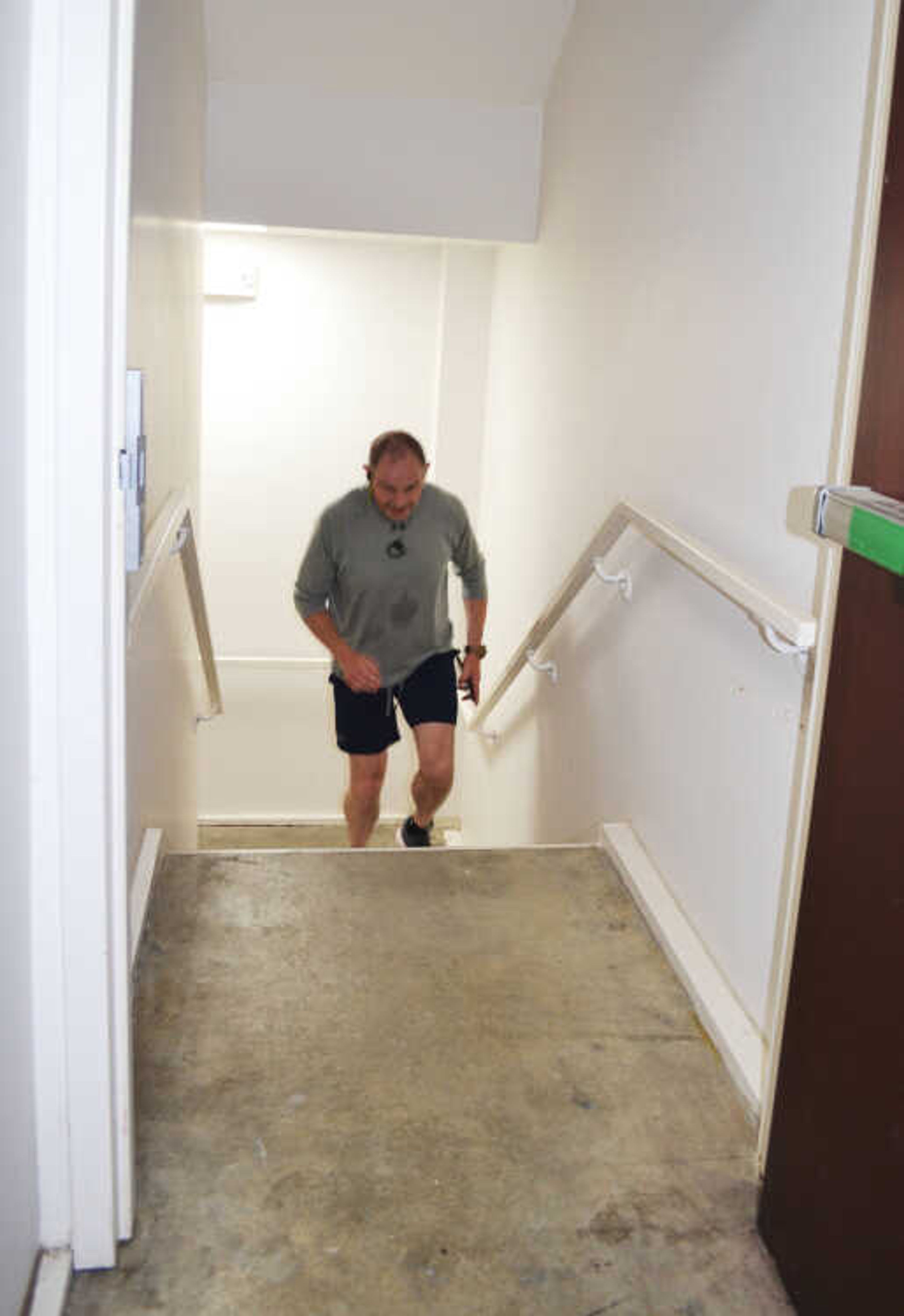 Marty Williams of Sikeston climbs stairs as part of the 9/11 step challenge Wednesday, Sept. 11, at Montgomery Bank in Sikeston.