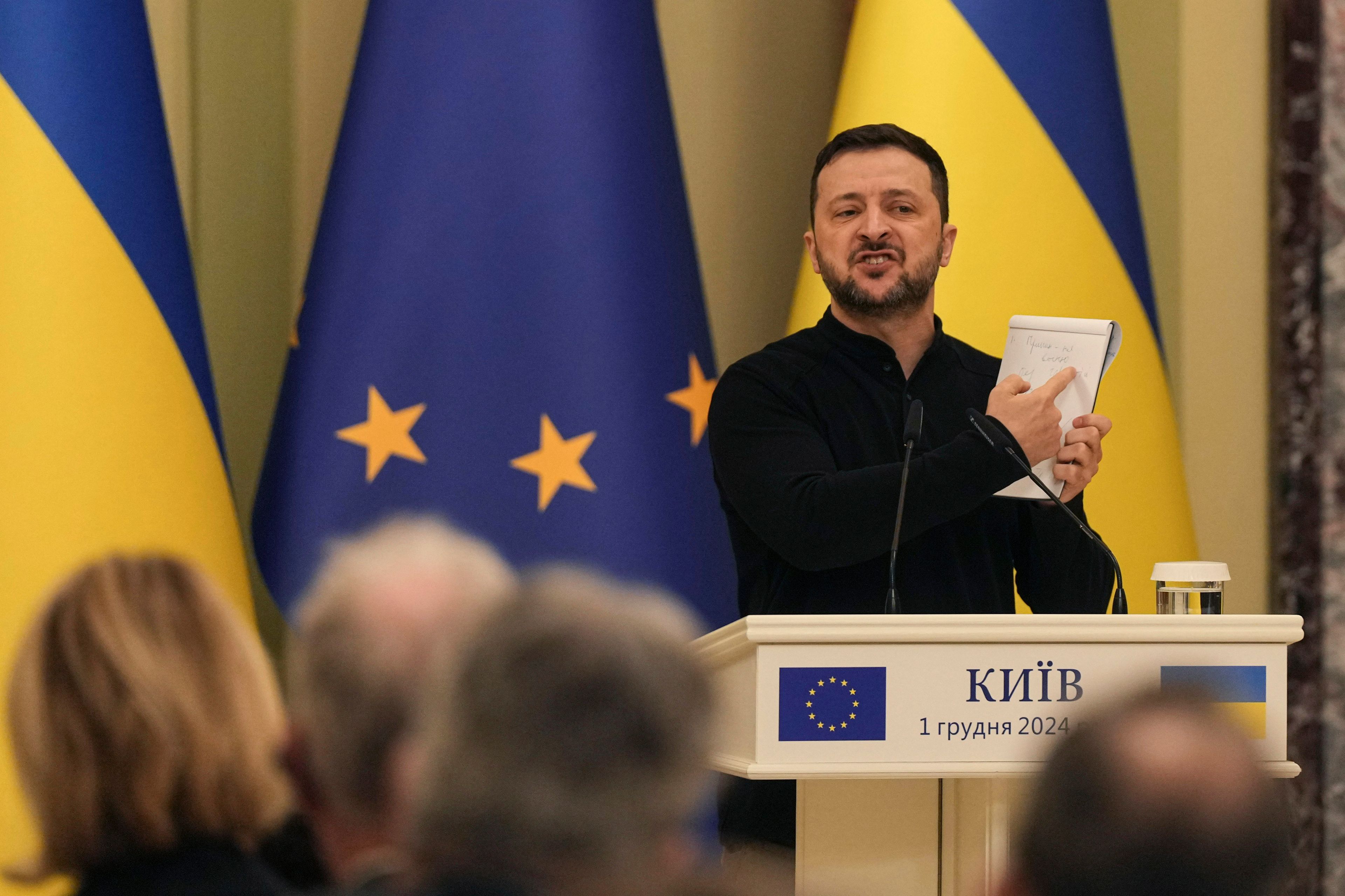 Ukraine's President Volodymyr Zelenskyy speaks during a joint press conference with European Council President Antonio Costa, in Kyiv, Ukraine, Sunday, Dec. 1, 2024. (AP Photo/Evgeniy Maloletka)