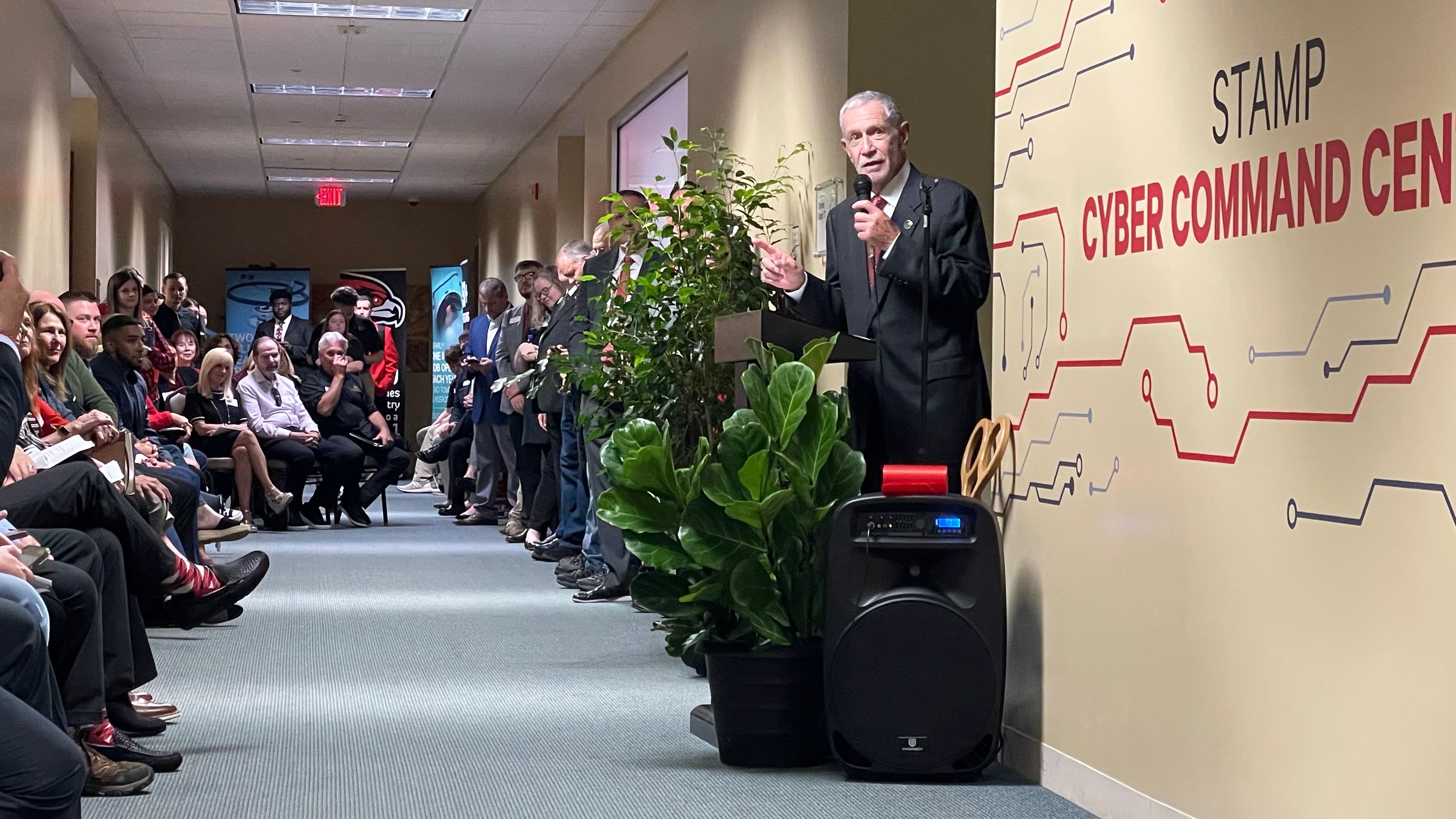 Southeast Missouri State University President Carlos Vargas addresses the crowd in the hallway outside the new Stamp Cyber Command Center, made possible by support from IBM, the state of Missouri and donor Charles Stamp. In a press release Stamp, a 1971 graduate of the university, said: “This center represents a significant step in preparing students for the challenges of today’s digital economy. I’m excited to contribute to creating a learning environment where students can build practical skills that will make them invaluable assets in the cybersecurity field.”
