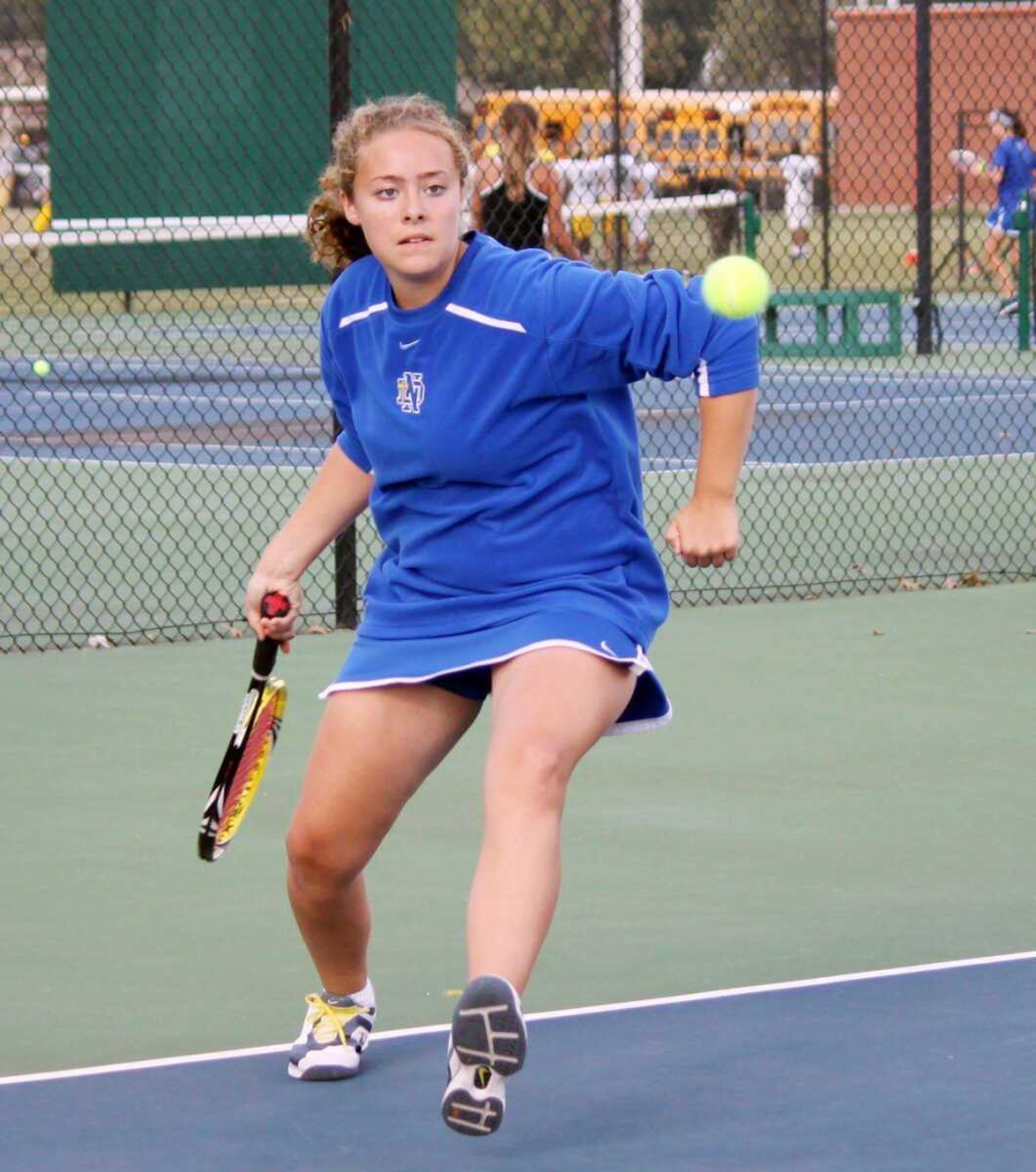 Notre Dame&#8217;s Carly Hopkins charges a ball. (Dustin Ward ~ Submitted photo)