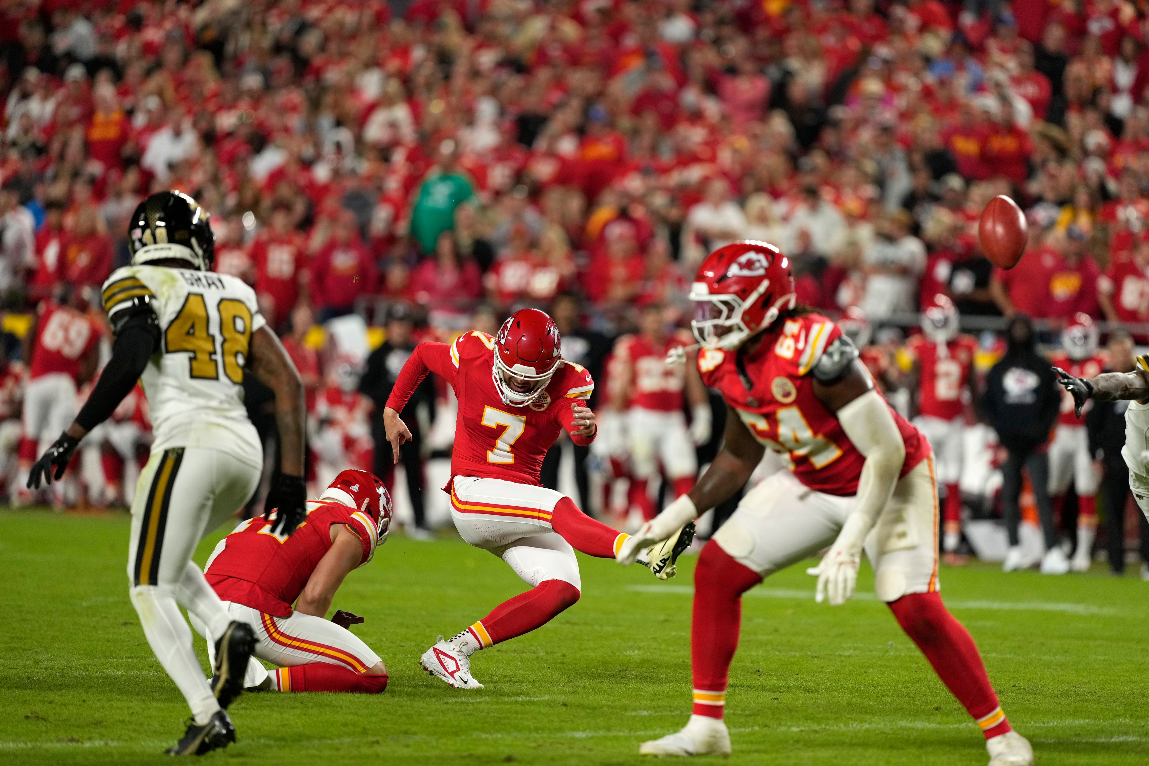 Kansas City Chiefs kicker Harrison Butker (7) makes a 38-yard field goal during the second half of an NFL football game against the New Orleans Saints Monday, Oct. 7, 2024, in Kansas City, Mo. (AP Photo/Charlie Riedel)