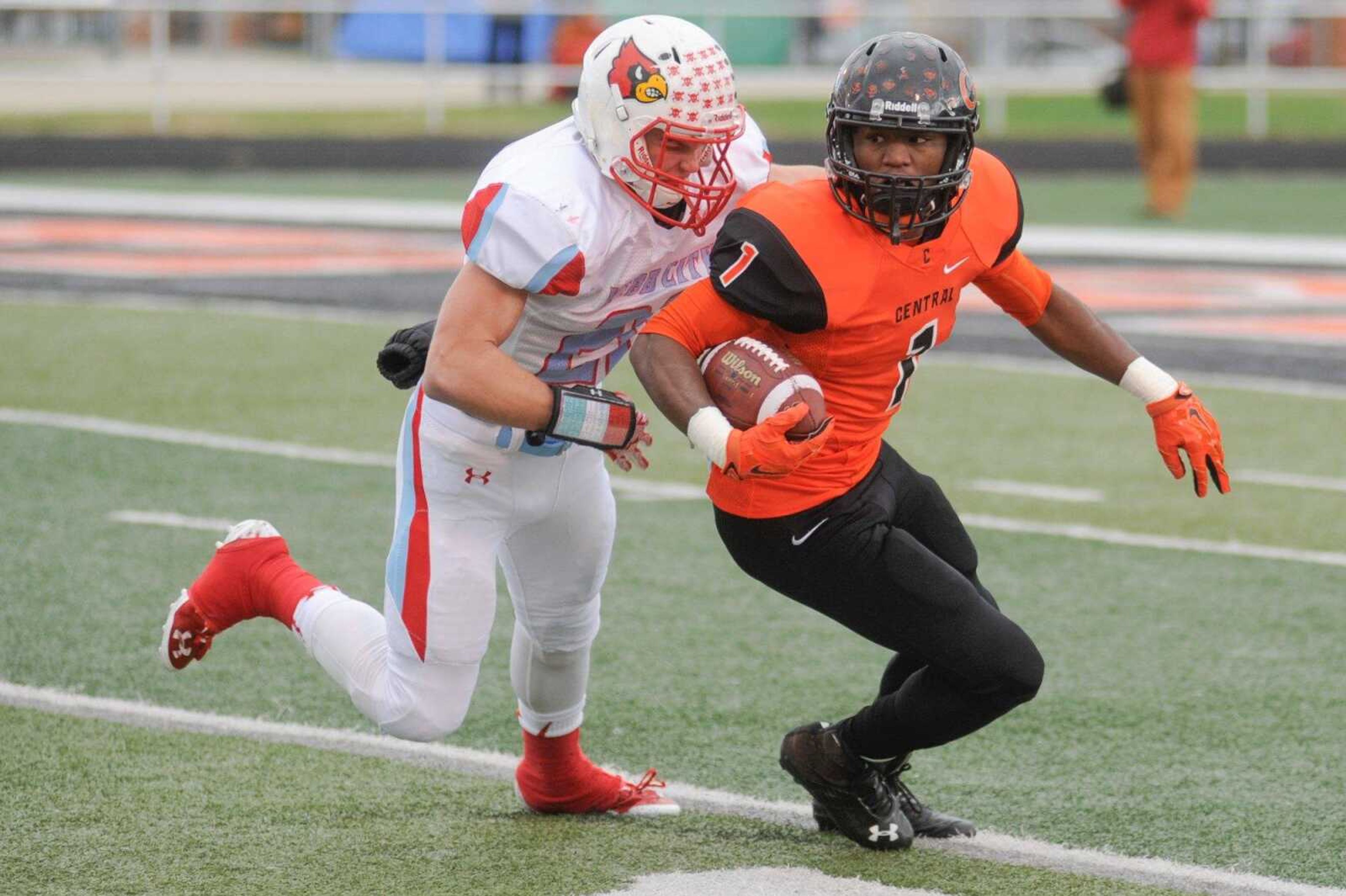 Cape Central's Al Young is brought down by Webb City's HunterVanlue in the first quarter during a Class 4 semifinal Saturday, Nov. 21, 2015 at Cape Central High School.