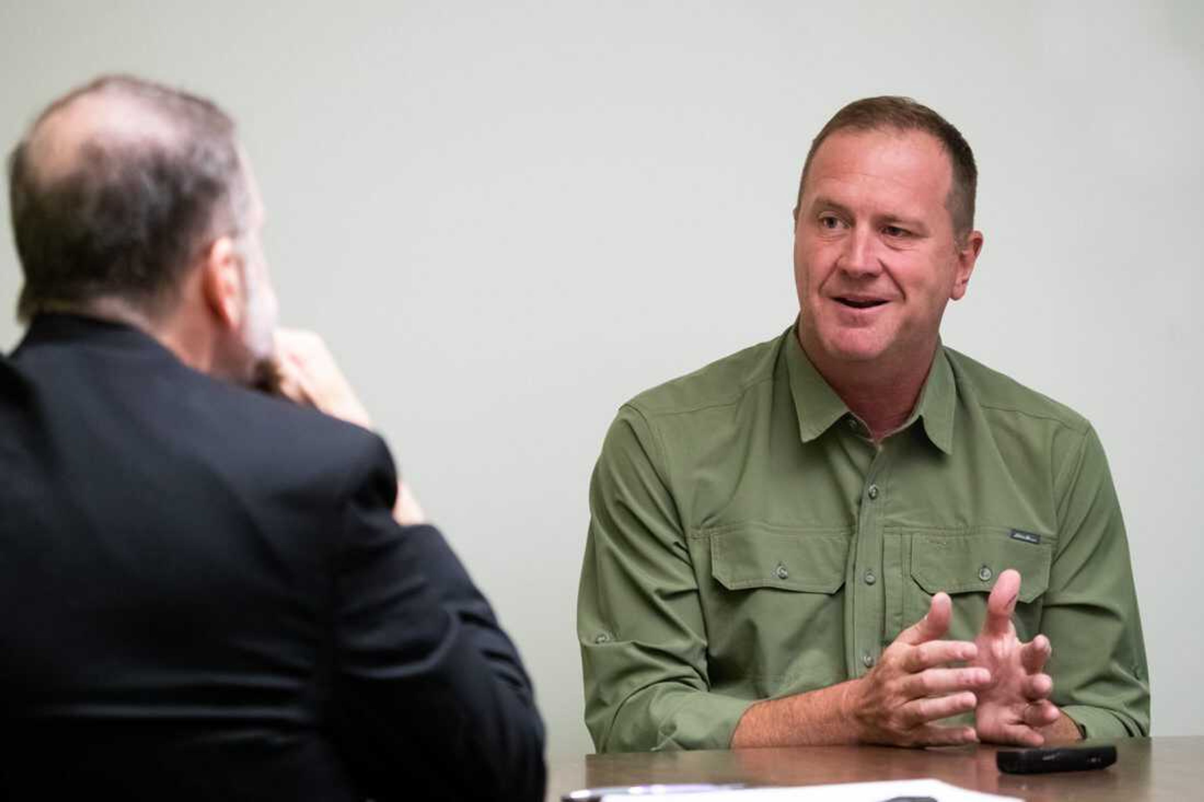 U.S. Sen. Eric Schmitt talks with Southeast Missourian business editor Jeff Long on Wednesday, Aug. 9, in Cape Girardeau. Schmitt discussed the actions of the Federal Reserve Board aimed at arresting inflation.