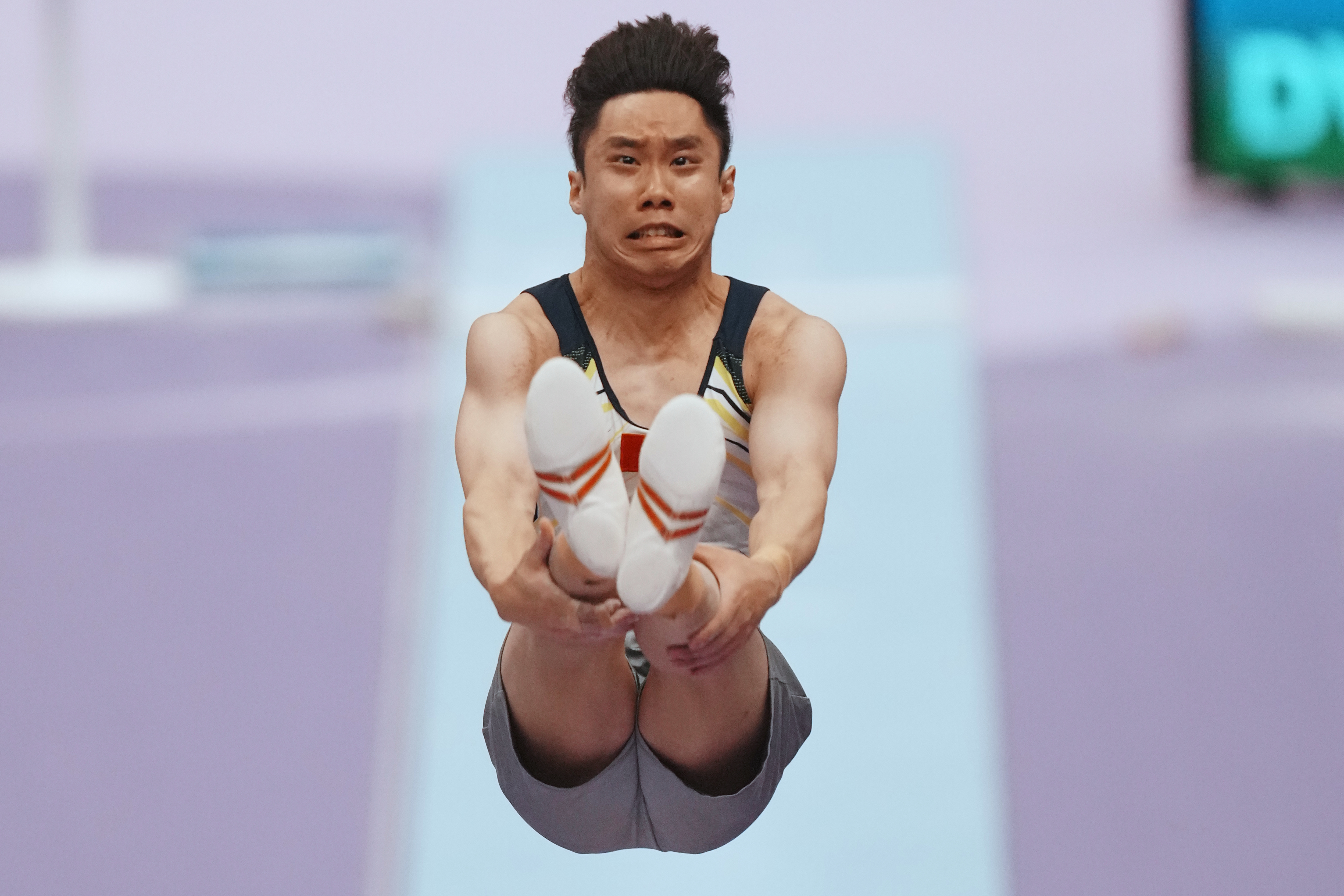 Photos of record-breaking swimmers and more from the Asian G