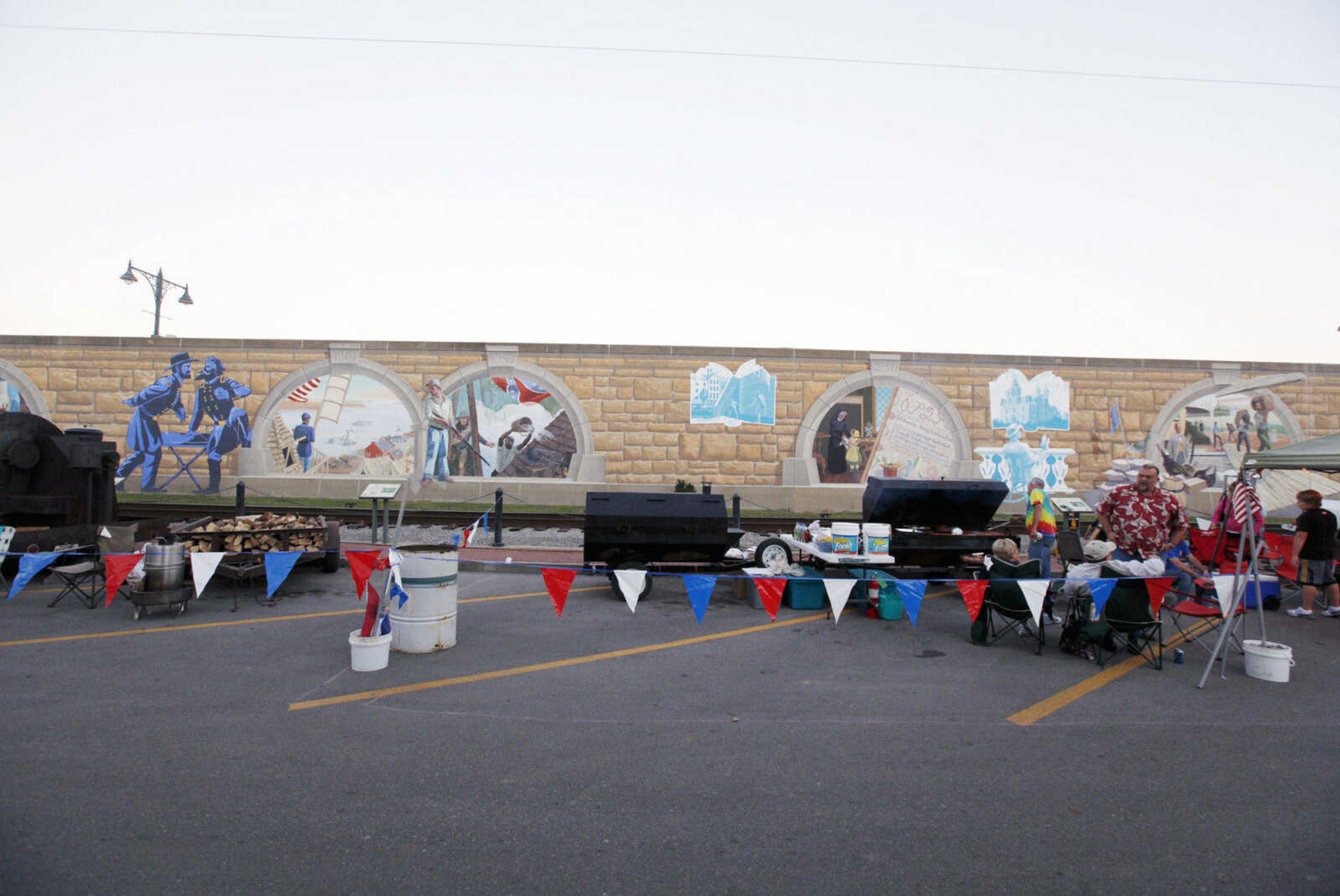 CHRIS MACKLER ~ photos@semissourian.com

Cape Electrical Supply's "The Rib Men" set their grills up on Water Street as a part of the BBQ Competition during the 14th annual River City Music Festival held in downtown Cape Girardeau on Friday, Oct. 1, 2010.