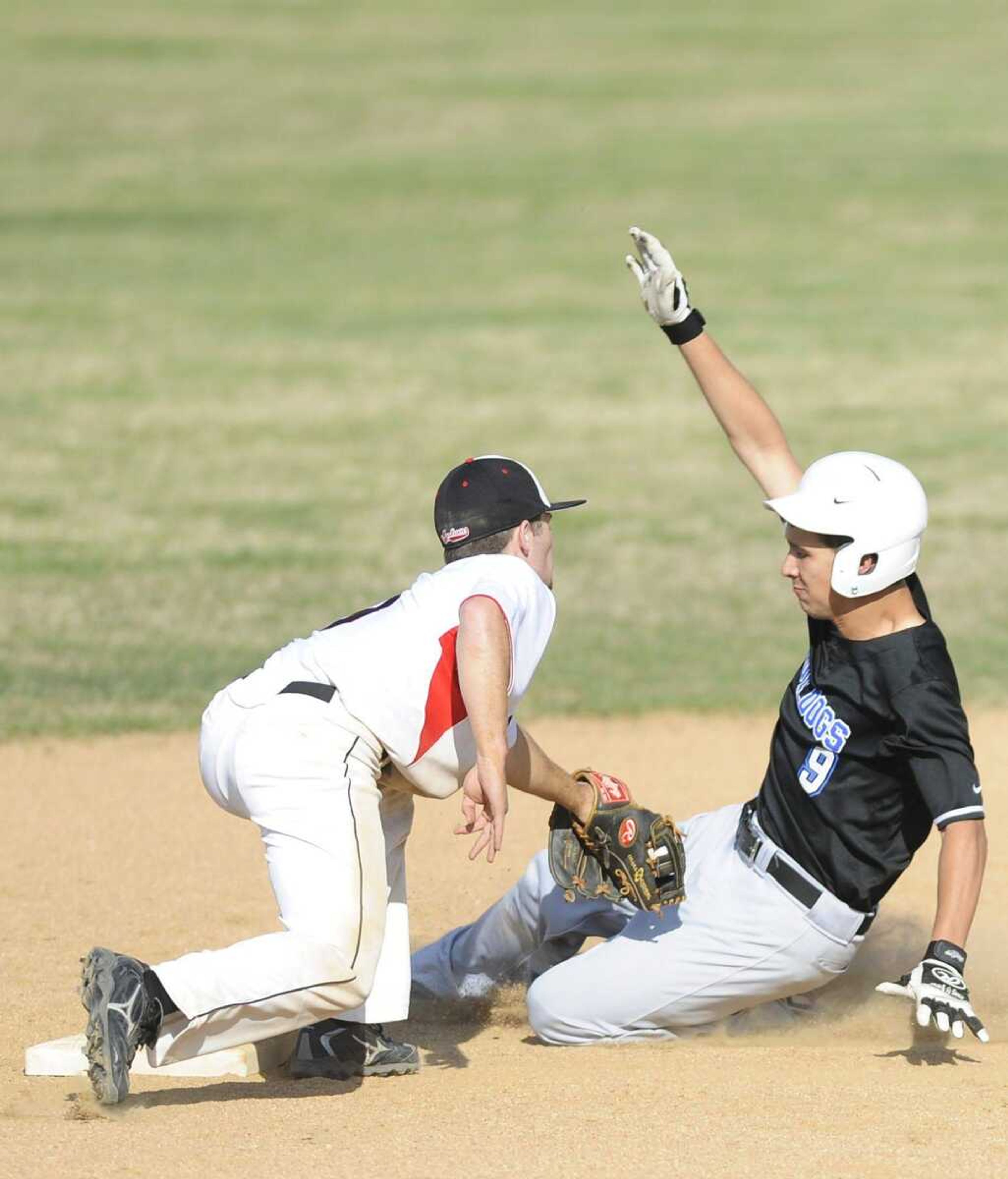 Jackson second baseman Ryan O&#8217;Rear tags out Notre Dame&#8217;s Jonathan Lynch, who attempted to steal second, during the third inning Tuesday in Jackson. The Indians won 5-4. (ADAM VOGLER)