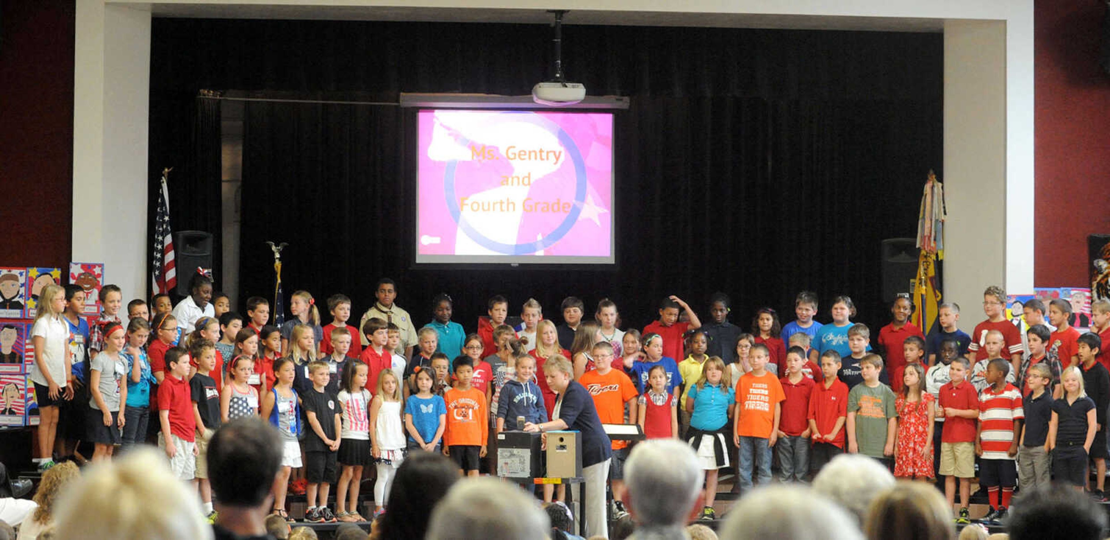 LAURA SIMON ~ lsimon@semissourian.com

Alma Schrader Elementary fourth-grade students sing "We Remember", Wednesday, Sept. 18, 2013, during 12th annual Constitution Day and Heroes Recognition Assembly.