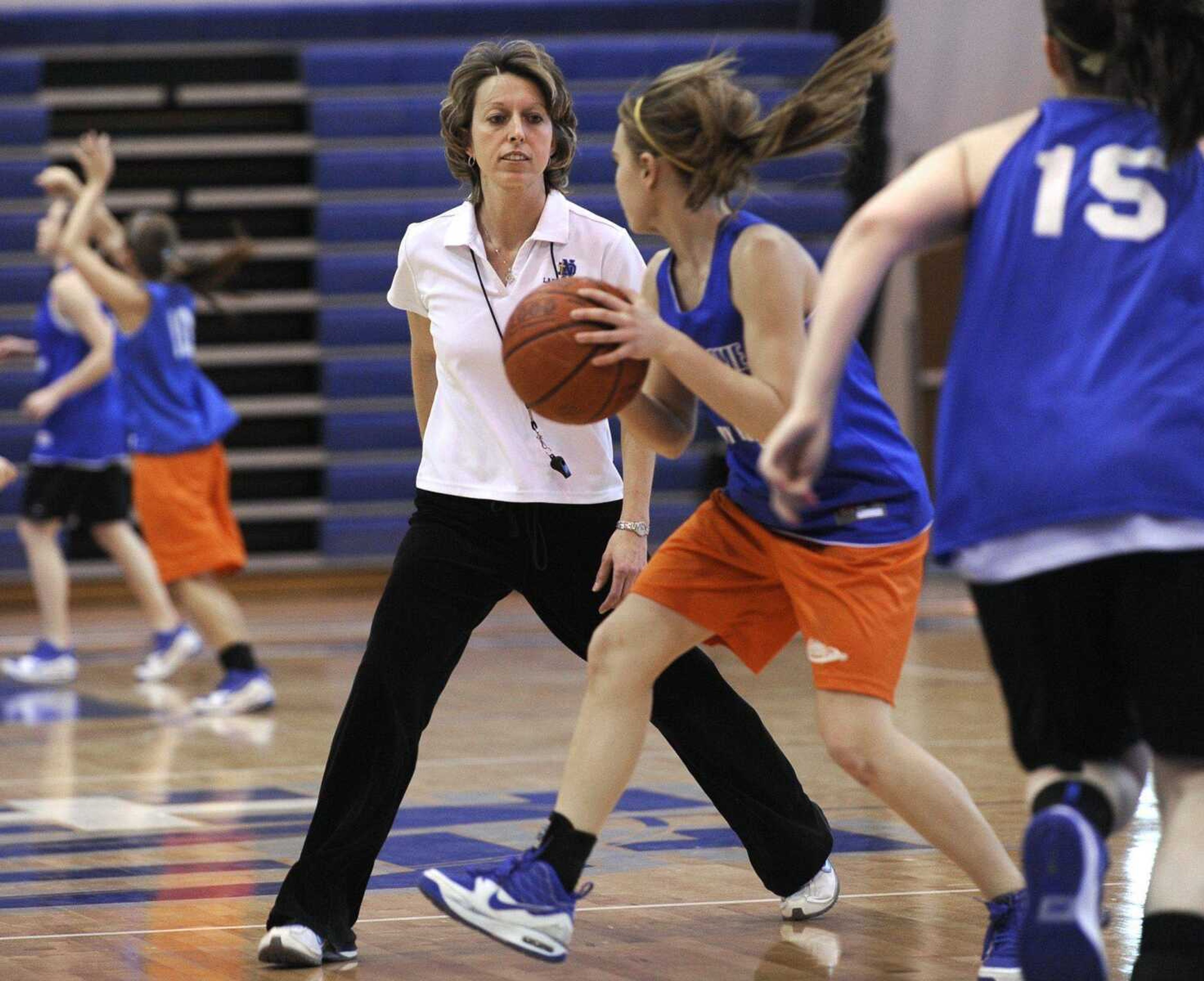 Notre Dame coach Renee Peters works with her team earlier this week as the Bulldogs prepared for the Class 4 final four. (Fred Lynch)