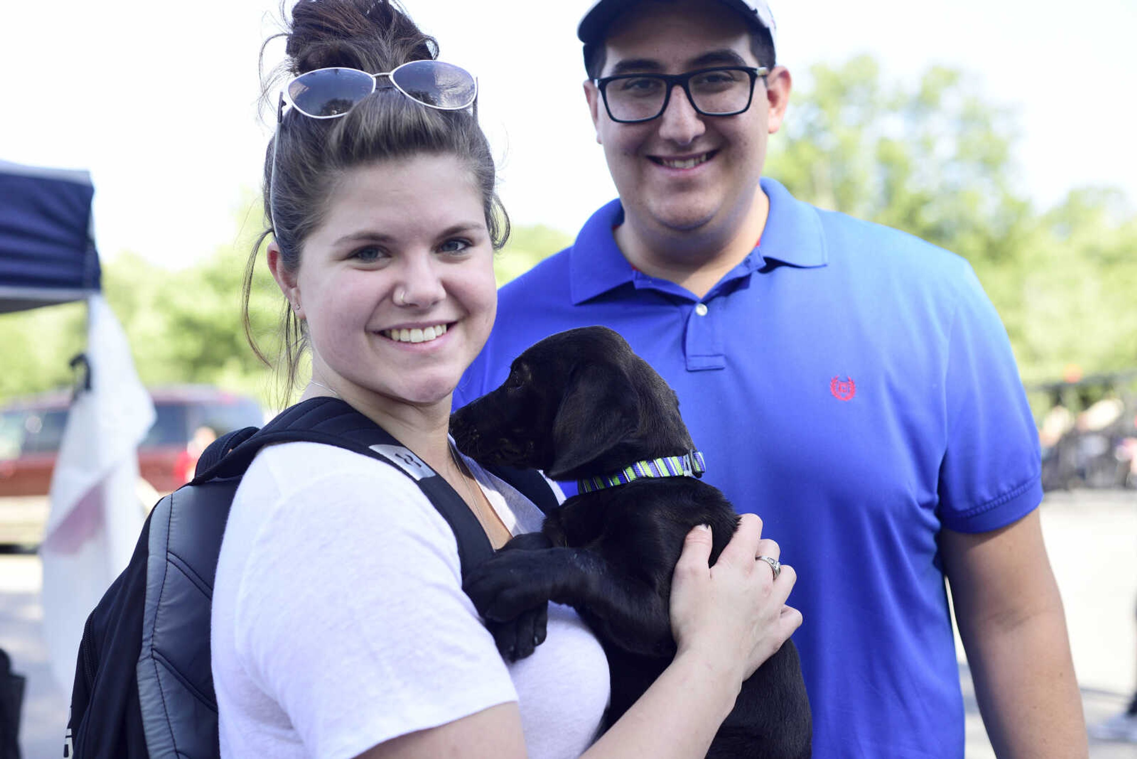 Lauren Sides and Christo Rice pose for a photo with Fabbri during the first ever St. Jude Heroes Yak 'n Run on Saturday, Aug. 26, 2017, at Trail of Tears State Park. All proceeds from the event support St. Jude Children's Research Hospital