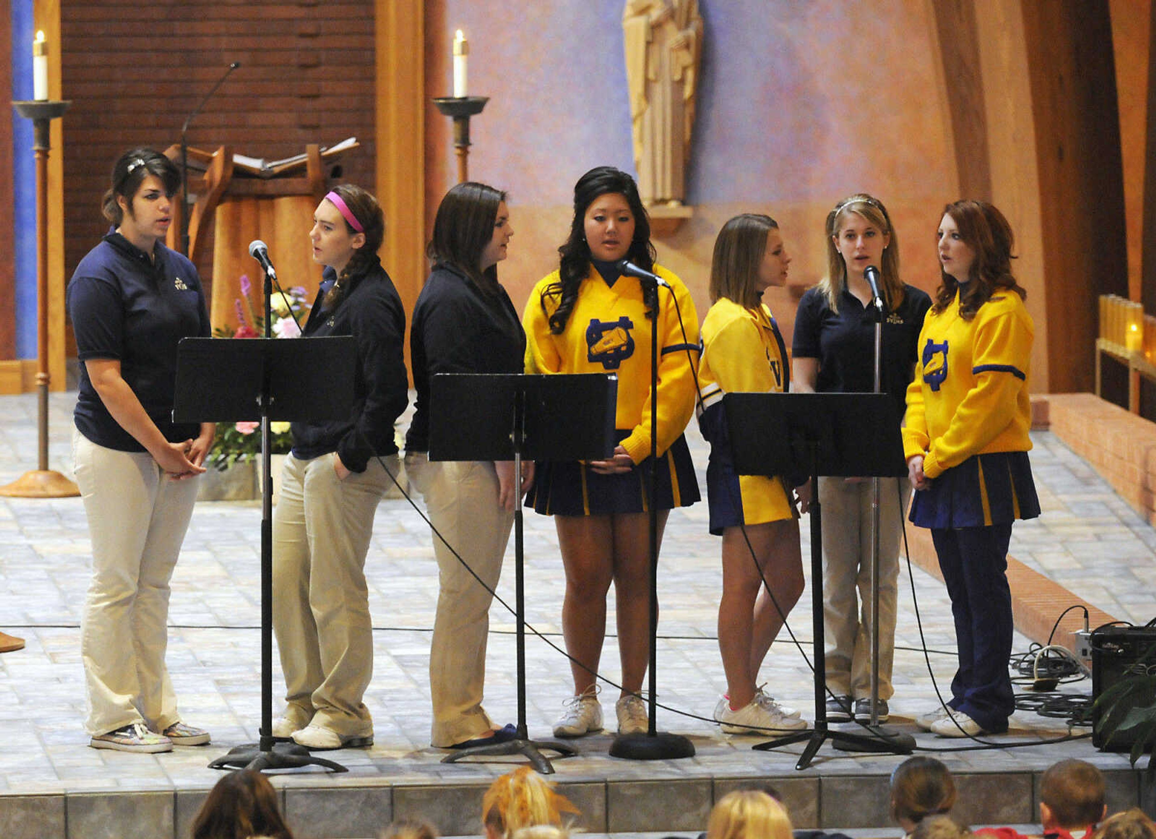 KRISTIN EBERTS ~ keberts@semissourian.com

Students sing during Mass at St. Vincent De Paul parish in Perryville, Mo., on Friday, Oct. 15, 2010. The Mass was followed by an assembly to celebrate the school's recognition on the list of the best 50 Catholic secondary schools in America, presented by the Catholic High School Honor Roll. This is the first time St. Vincent has received this distinction.