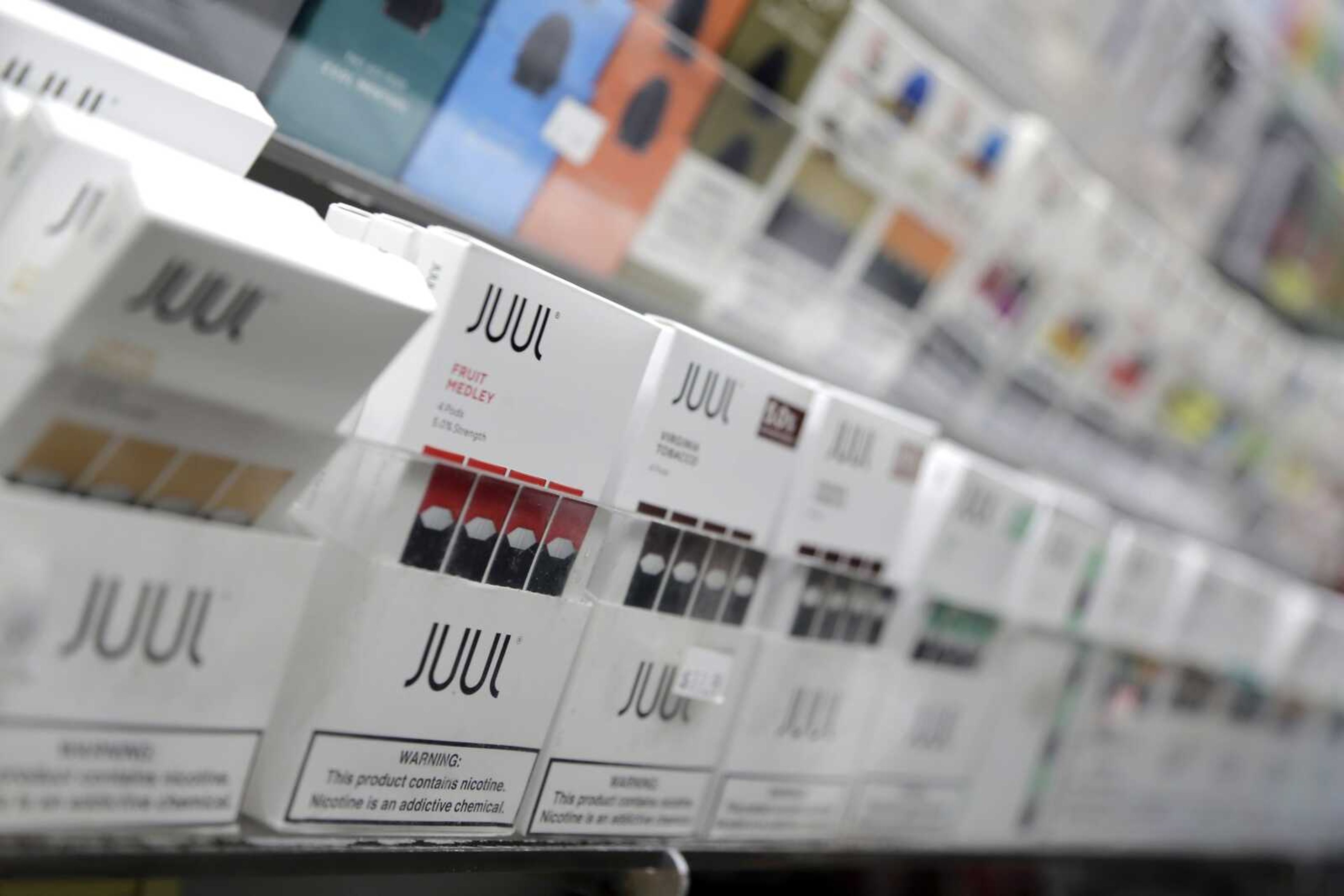 Juul products are displayed at a smoke shop Dec. 20, 2018, in New York.