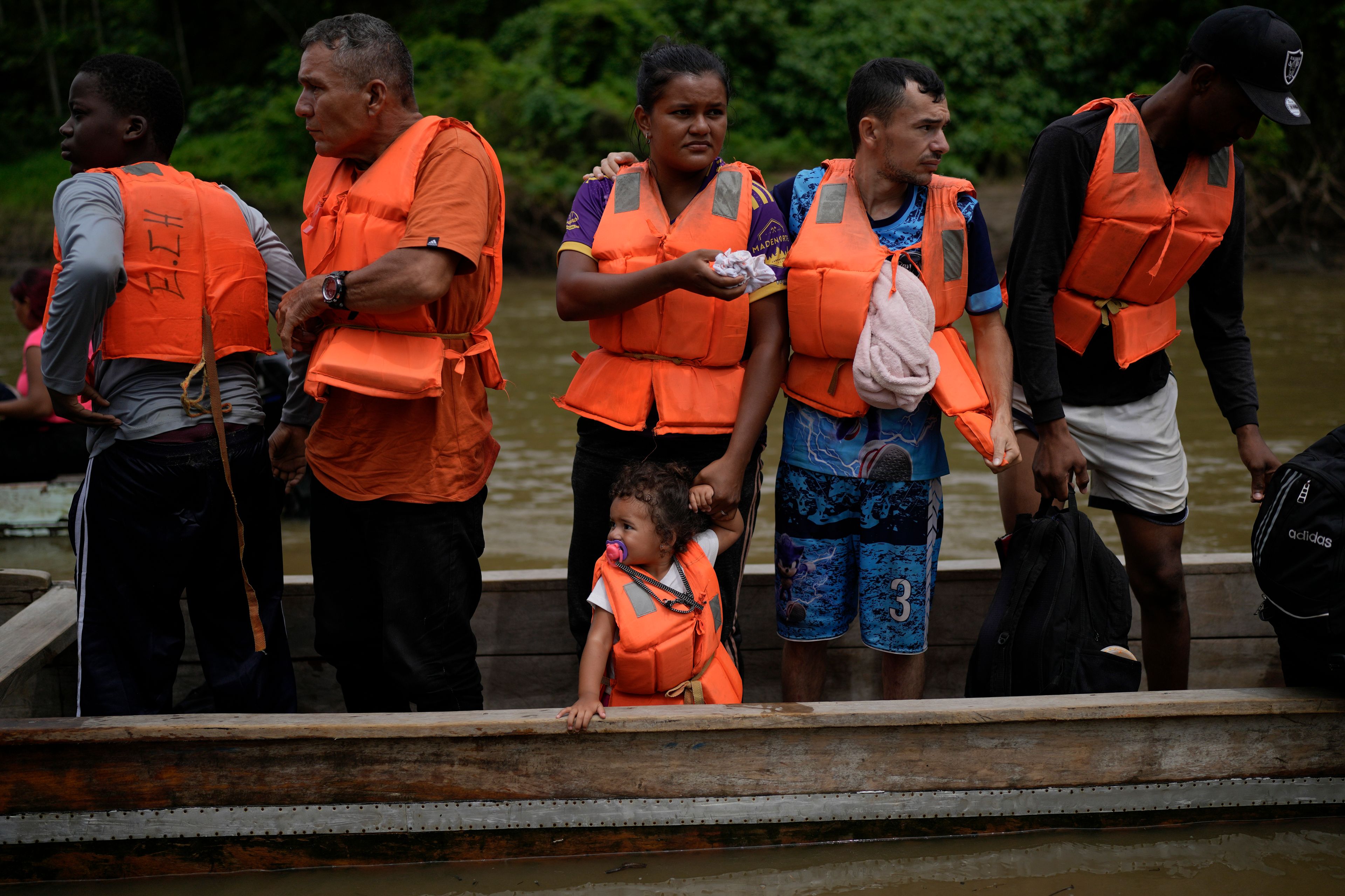 Migrants arrive by boat to Lajas Blancas, Panama, Thursday, Sept. 26, 2024, after their trek across the Darien Gap from Colombia in hopes of reaching the U.S. (AP Photo/Matias Delacroix)