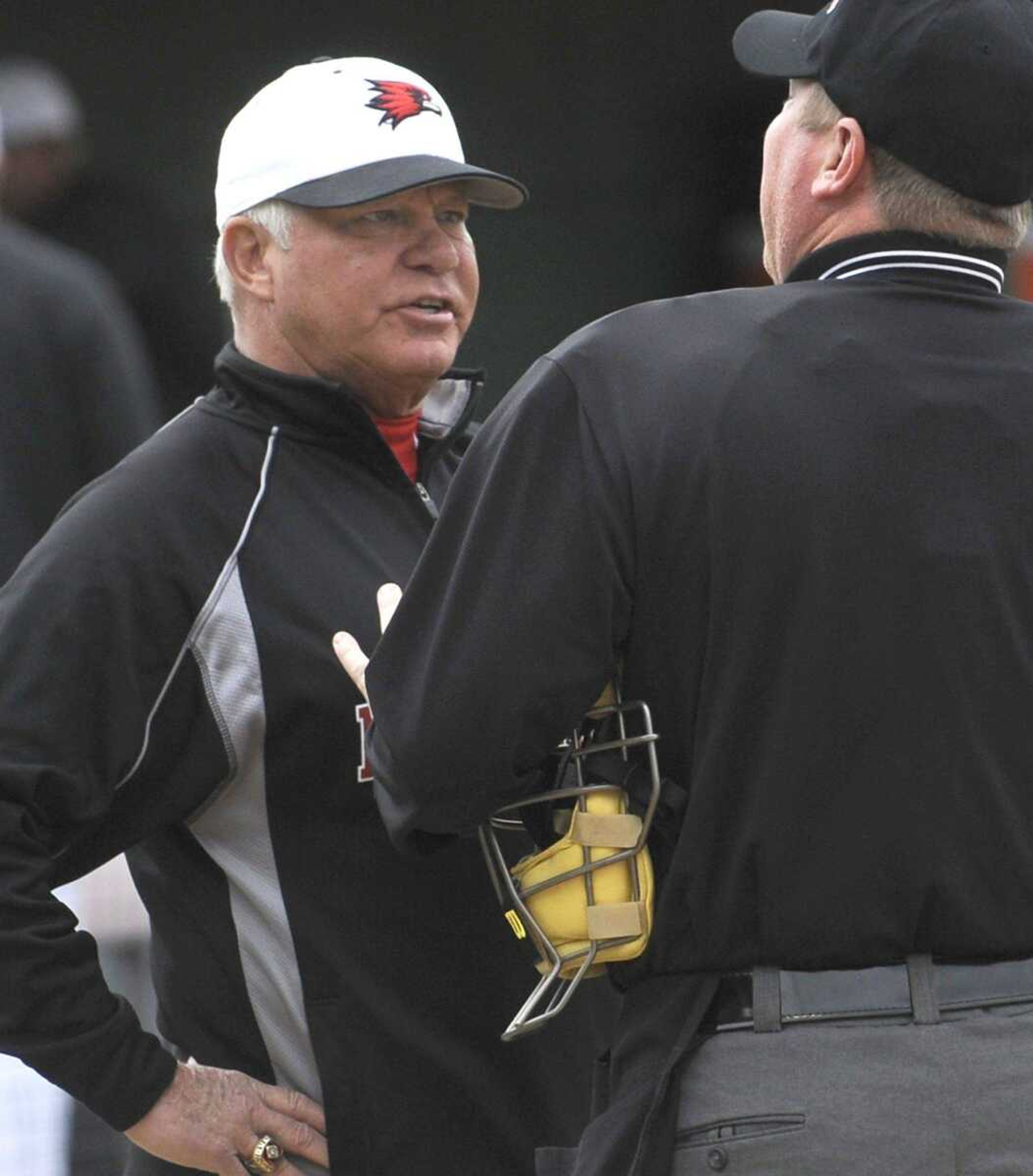 Southeast coach Mark Hogan discusses the umpire&#8217;s call during the first inning with Illinois State Sunday, March 4, 2012 at Capaha Field. (Fred Lynch)