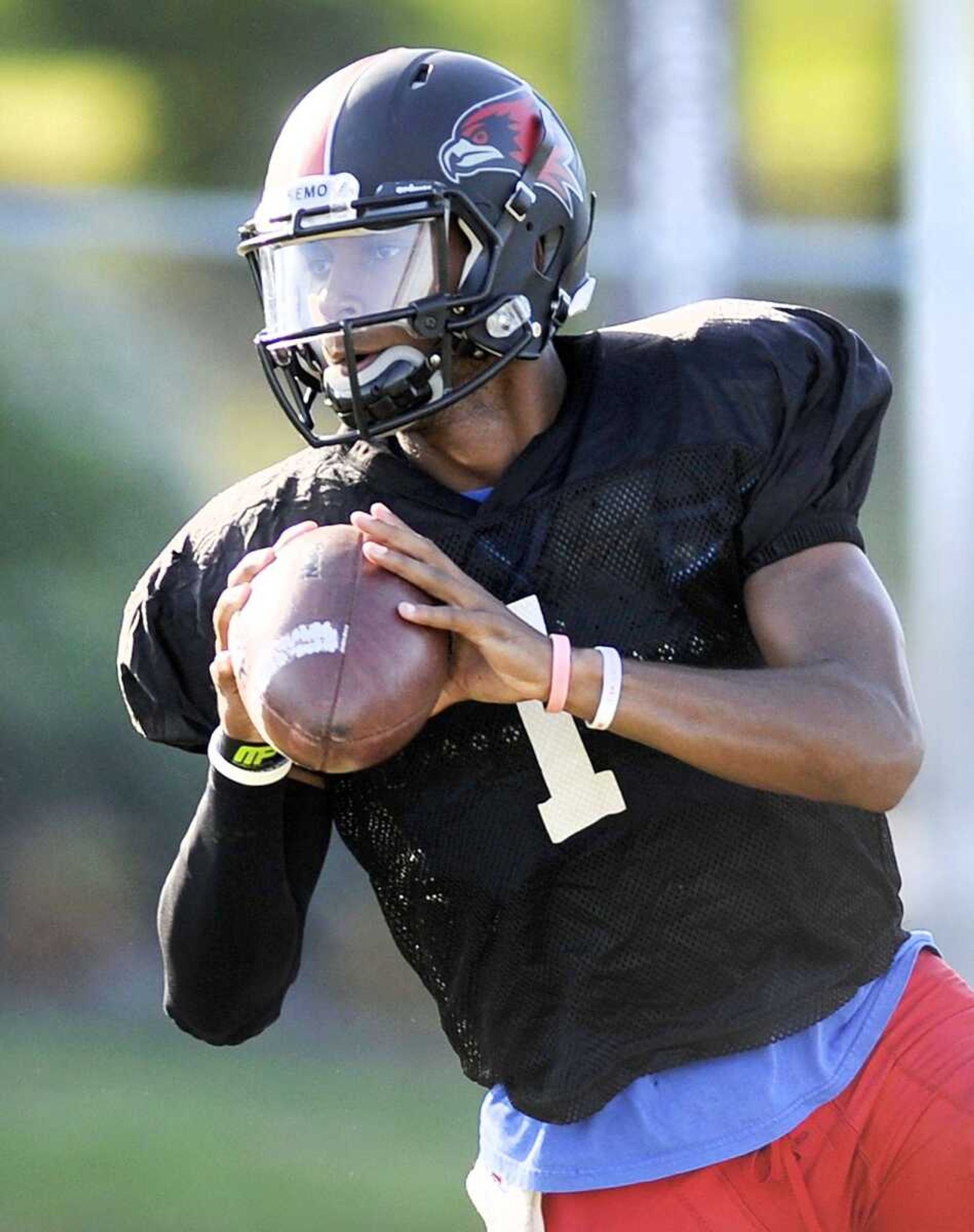 Southeast Missouri State University quarterback, Dante Vandeven, is seen wearing the number one jersey during the Redhawks practice, Tuesday, Sept. 22, 2015, in Cape Girardeau. (Laura Simon)