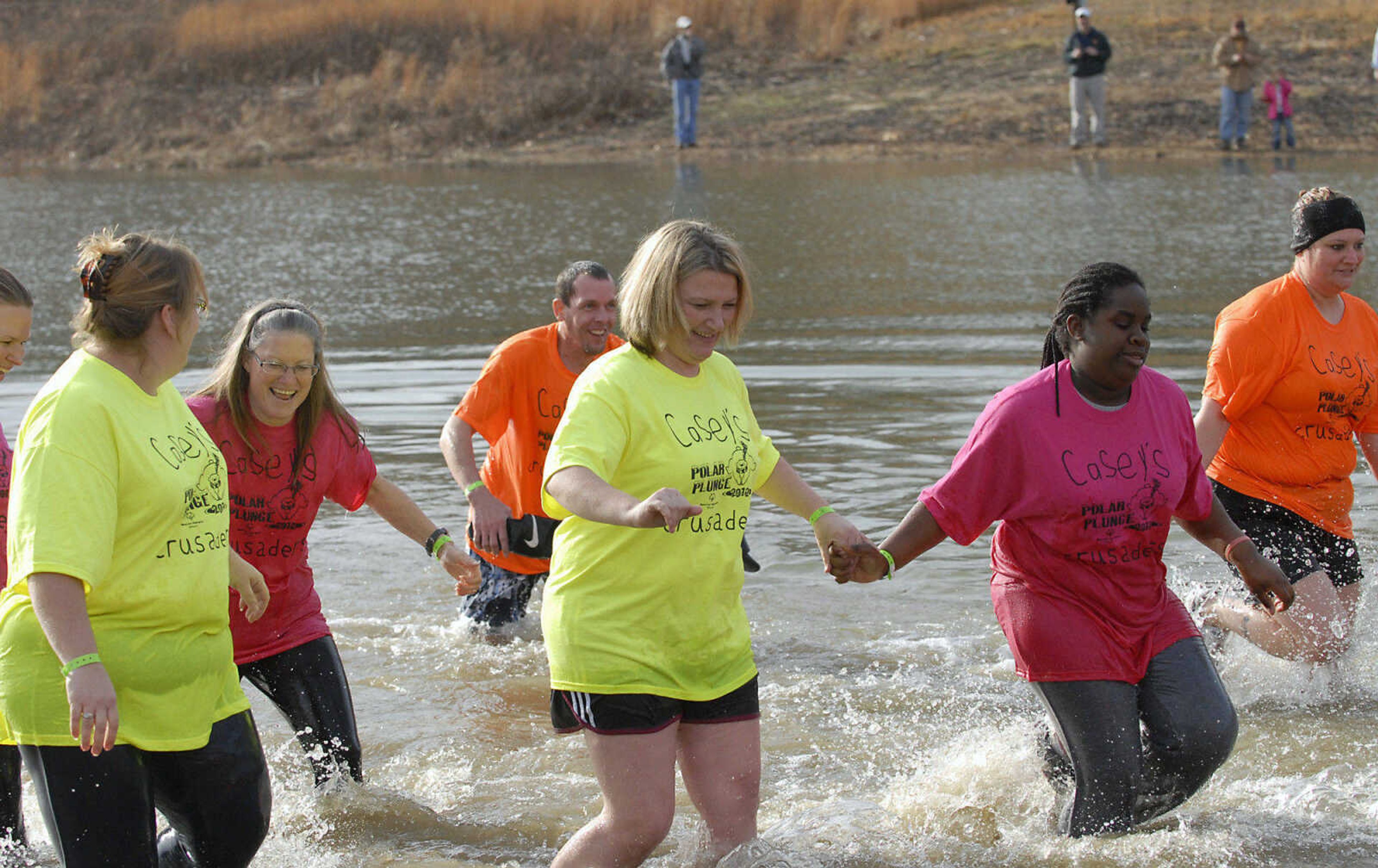 KRISTIN EBERTS ~ keberts@semissourian.com

Plungers brave the water during the 2012 Polar Plunge at the Trail of Tears State Park's Lake Boutin on Saturday, Feb. 4, 2012.