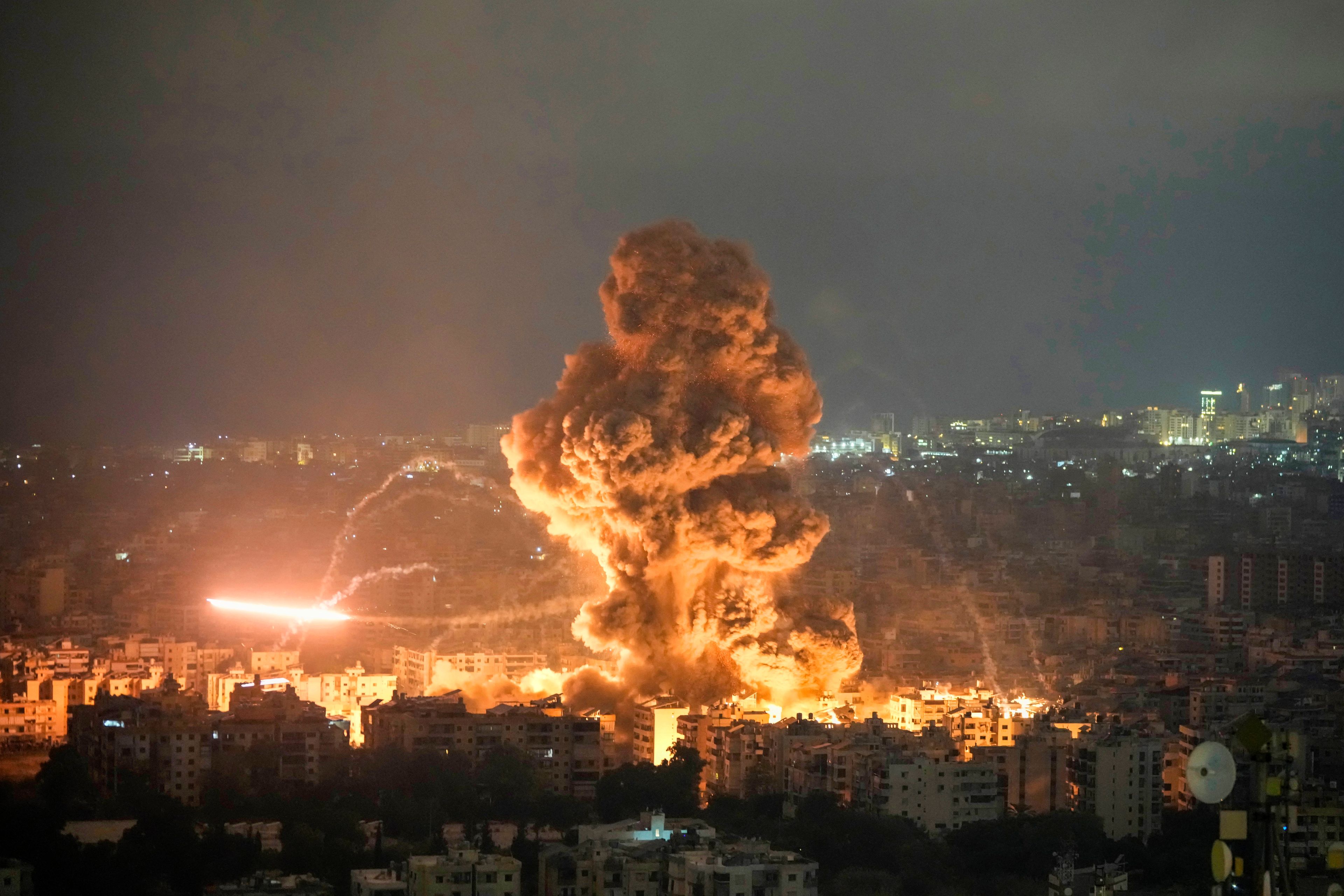 Flames and smoke rise from an Israeli airstrike in Dahiyeh, Beirut, Lebanon, Sunday, Oct. 6, 2024. (AP Photo/Bilal Hussein)