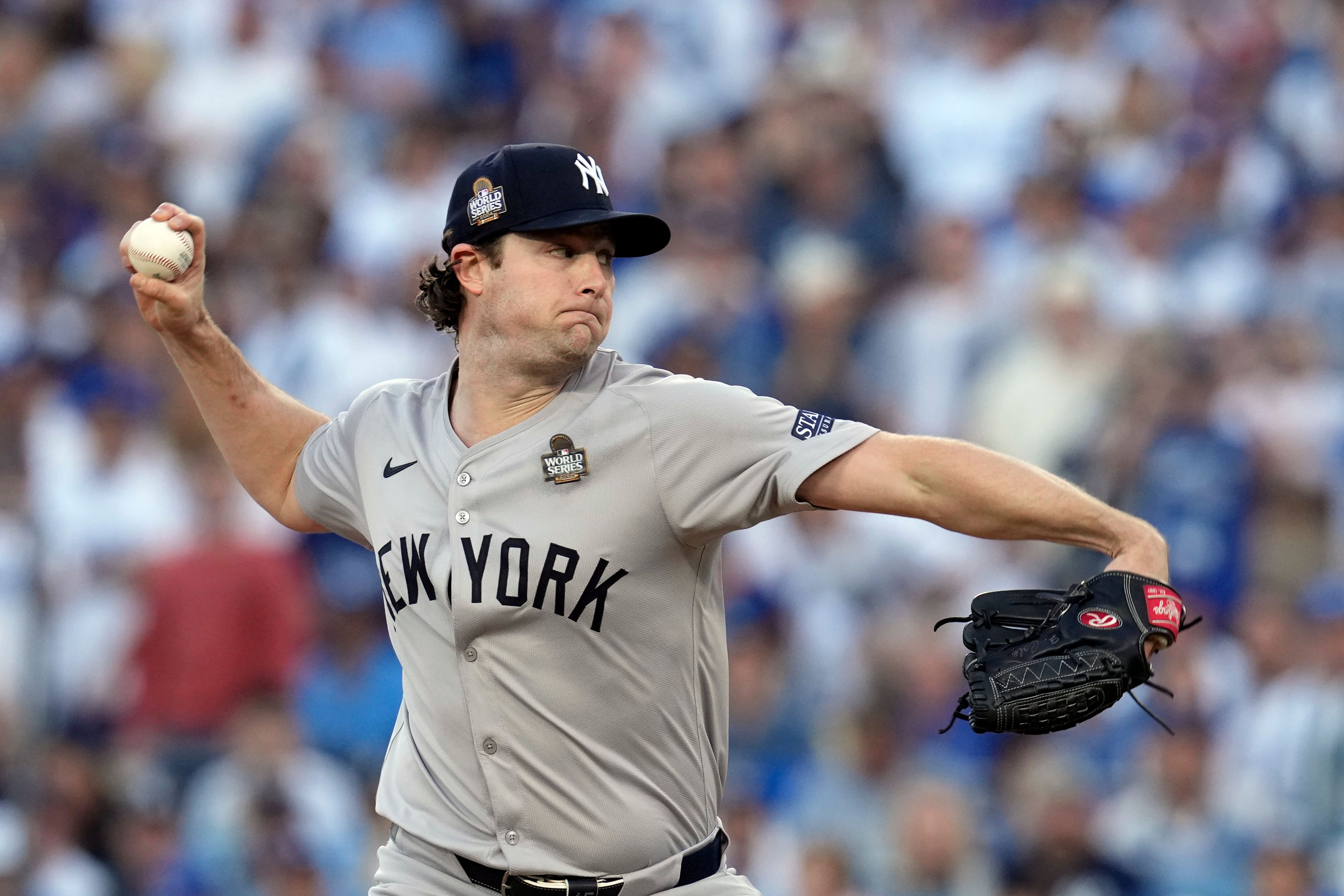 New York Yankees starting pitcher Gerrit Cole throws against the Los Angeles Dodgers during the first inning in Game 1 of the baseball World Series, Friday, Oct. 25, 2024, in Los Angeles. (AP Photo/Godofredo A. Vásquez)