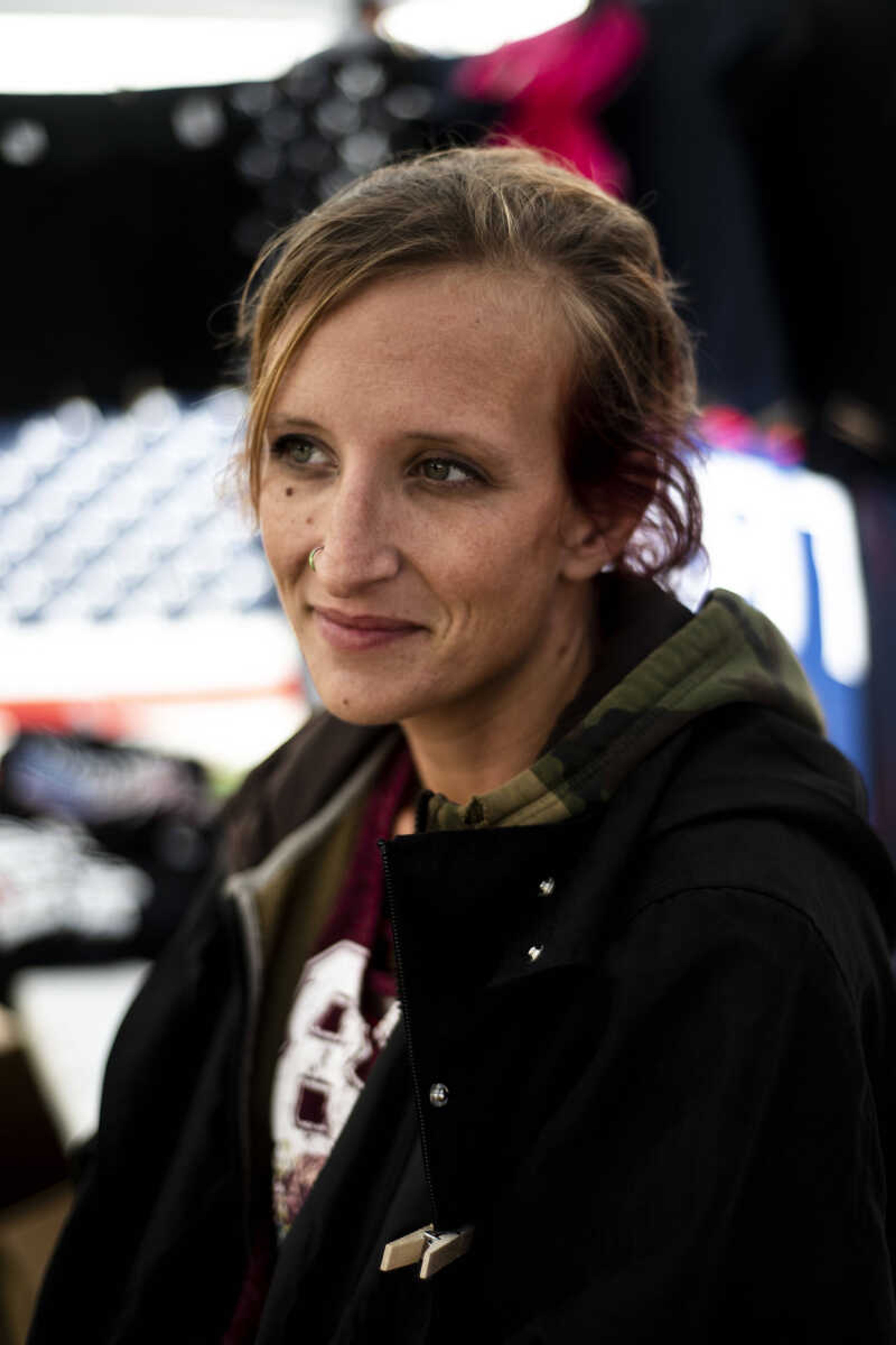 Samantha Wade, of Tennessee, sits in her merchandise booth Monday, Nov. 5, 2018, in Cape Girardeau. Wade said her company has been following President Trump through his rally time, selling merchandise and souvenirs along the way.