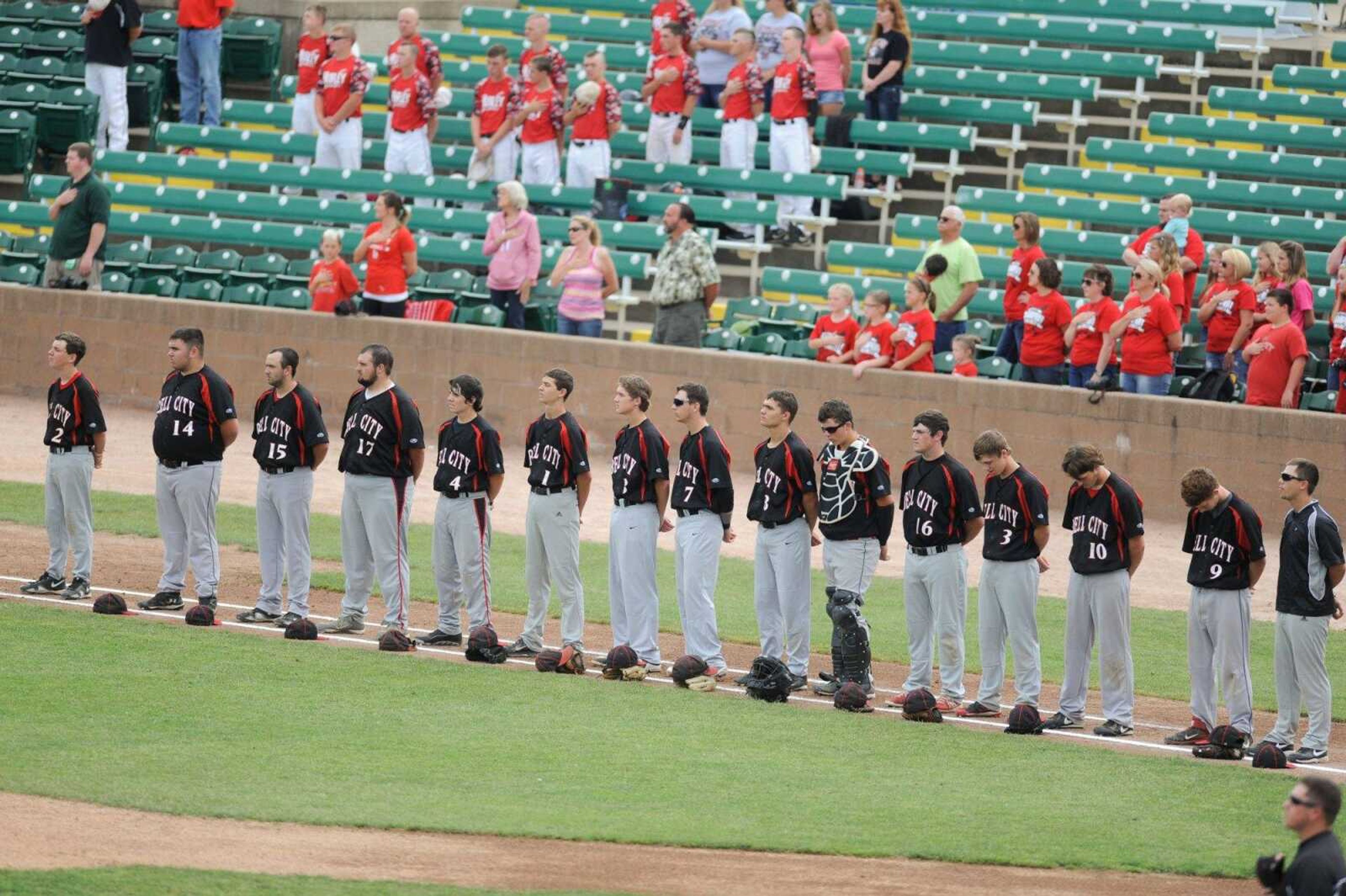 Bell City players line up for the national anthem at the start of a Class 1 semifinal against Northwest, Tuesday, June 2, 2015 in O Fallon, Missouri. (Glenn Landberg)