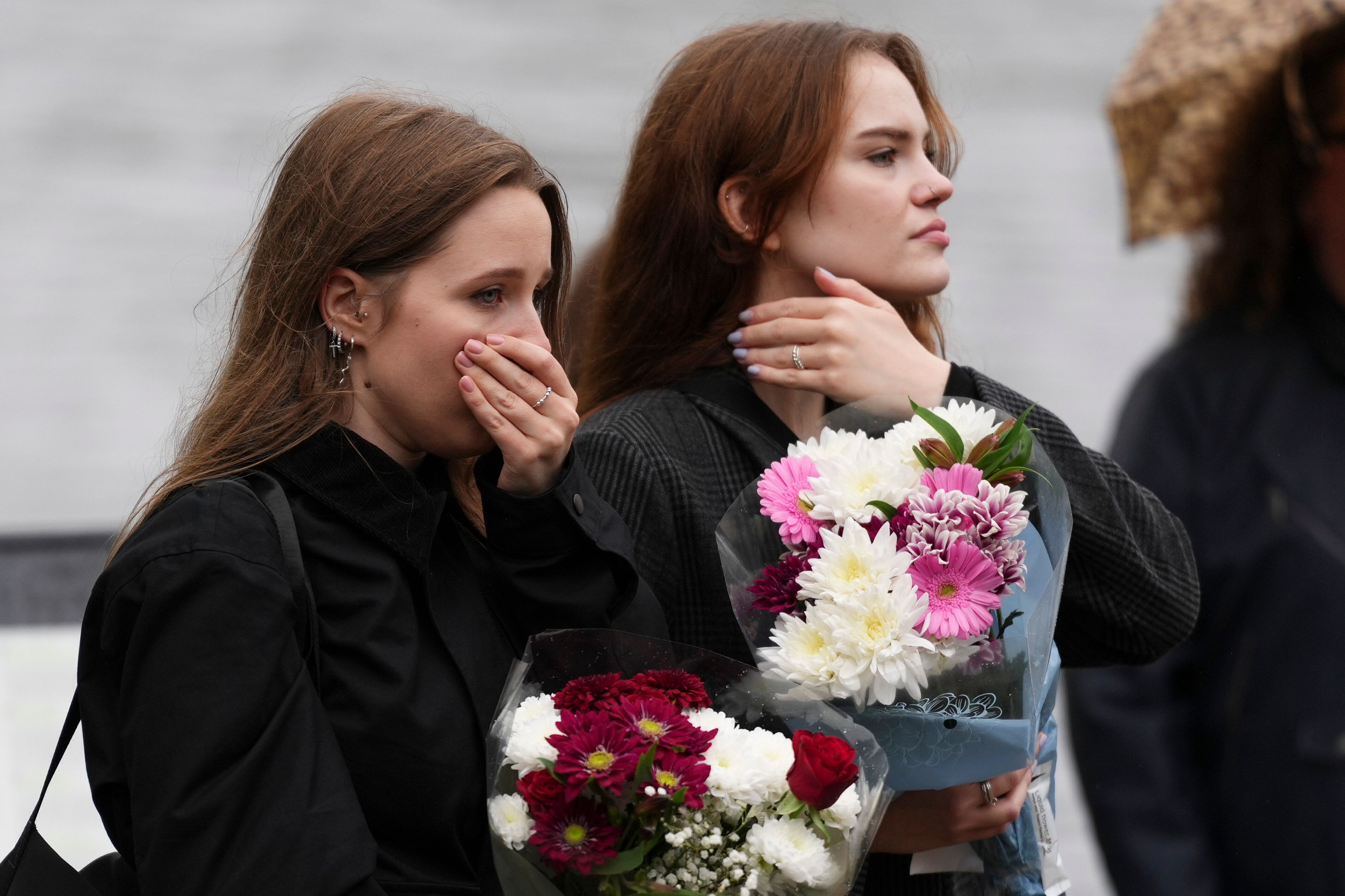 Fans gather for a vigil with flowers to pay tribute to late British singer Liam Payne, former member of the British pop band One Direction in Hyde Park in London, Sunday, Oct. 20, 2024, in London. (Photo by Scott A Garfitt/Invision/AP)